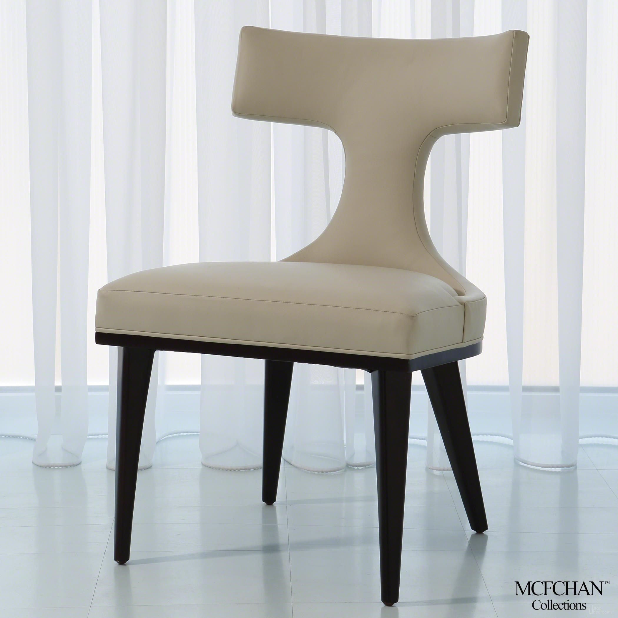 The appearance of Anvil Back Dining Chair In Ivory Leather designed by Global Views in the modern / contemporary interior design. This ivory piece of furniture  was selected by 1StopBedrooms from Anvil Collection to add a touch of cosiness and style into your home. Sku: MC-2511. Material: Leather. Chair Type: Side Chair.