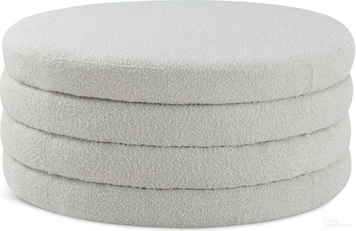 The appearance of Aphia Boucle Fabric Ottoman/Coffee Table In Cream designed by Meridian in the modern / contemporary interior design. This cream piece of furniture was selected by 1StopBedrooms from Aphia Collection to add a touch of cosiness and style into your home. Sku: 154Cream. Material: Boucle.