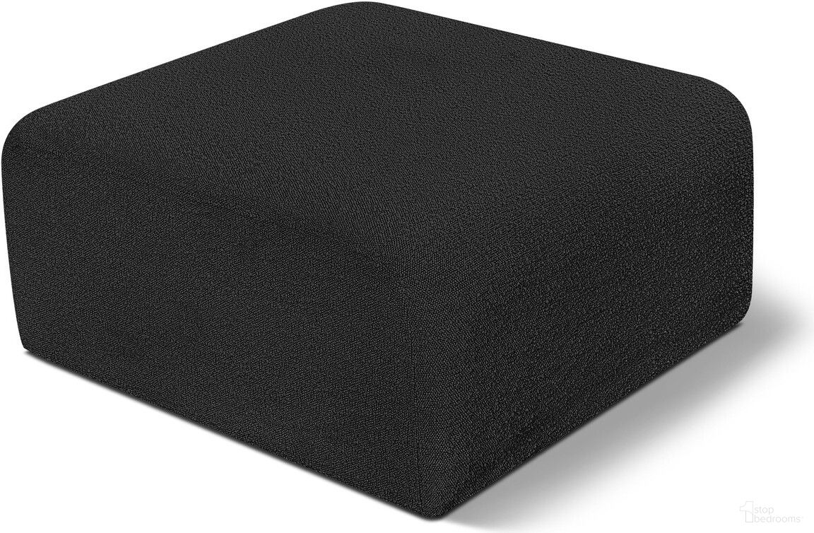 The appearance of Arc Boucle Fabric Ottoman In Black designed by Meridian in the modern / contemporary interior design. This black piece of furniture  was selected by 1StopBedrooms from Arc Collection to add a touch of cosiness and style into your home. Sku: 102Black-Ott. Material: Boucle.