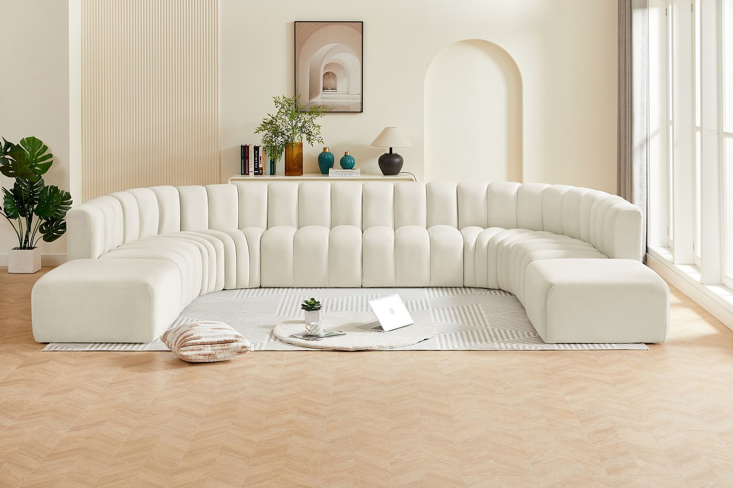 The appearance of Arc 10 Piece Modular Sofa In Cream Velvet designed by Meridian in the modern / contemporary interior design. This cream velvet piece of furniture was selected by 1StopBedrooms from Arc Collection to add a touch of cosiness and style into your home. Sku: 103Cream-ST;103Cream-ST;103Cream-ST;103Cream-ST;103Cream-CC;103Cream-CC;103Cream-CC;103Cream-CC;103Cream-Ott;103Cream-Ott. Material: Velvet. Layout: Modular.