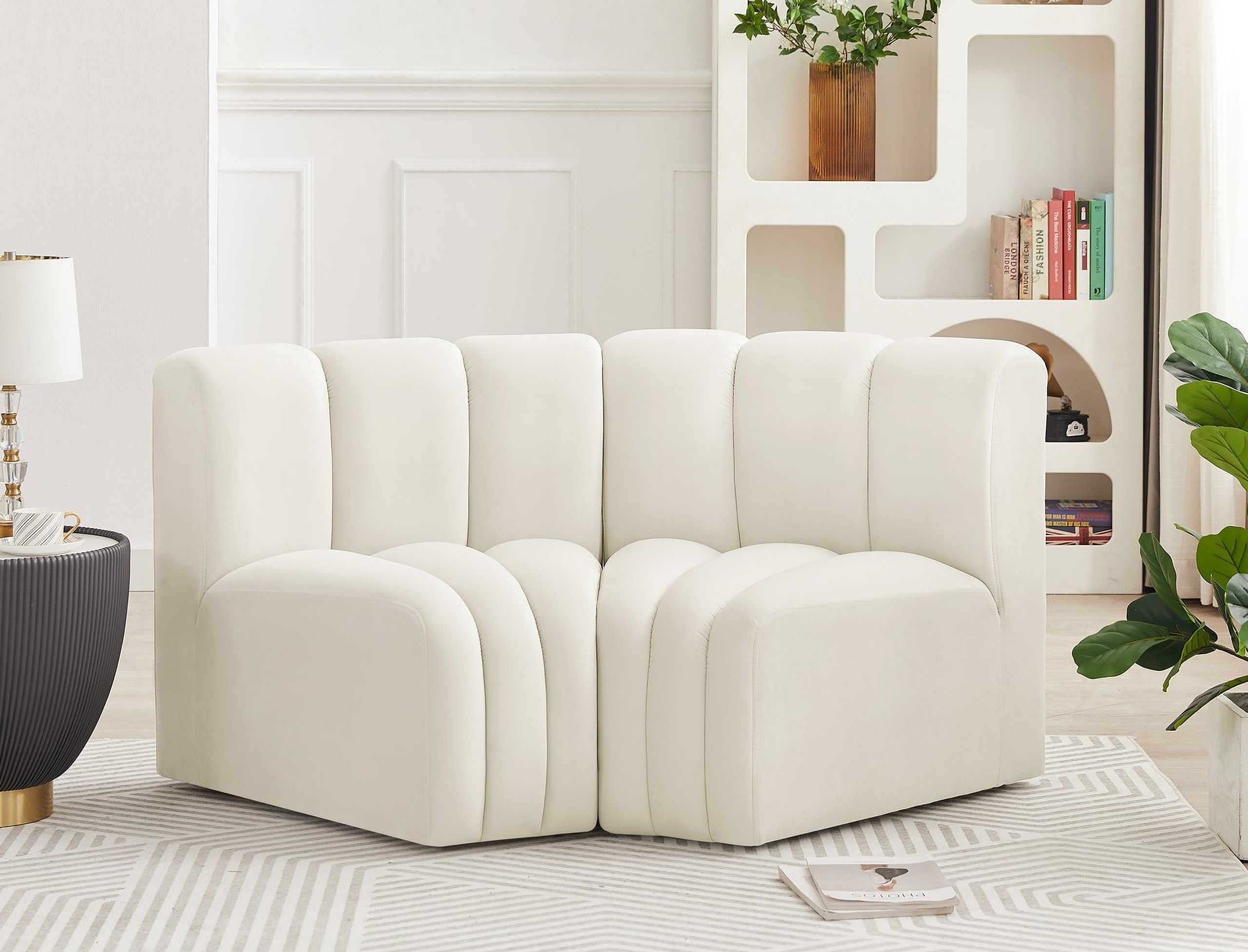 The appearance of Arc 2 Piece Modular Sofa In Cream Velvet designed by Meridian in the modern / contemporary interior design. This cream velvet piece of furniture was selected by 1StopBedrooms from Arc Collection to add a touch of cosiness and style into your home. Sku: 103Cream-CC;103Cream-CC. Material: Velvet. Layout: Modular.