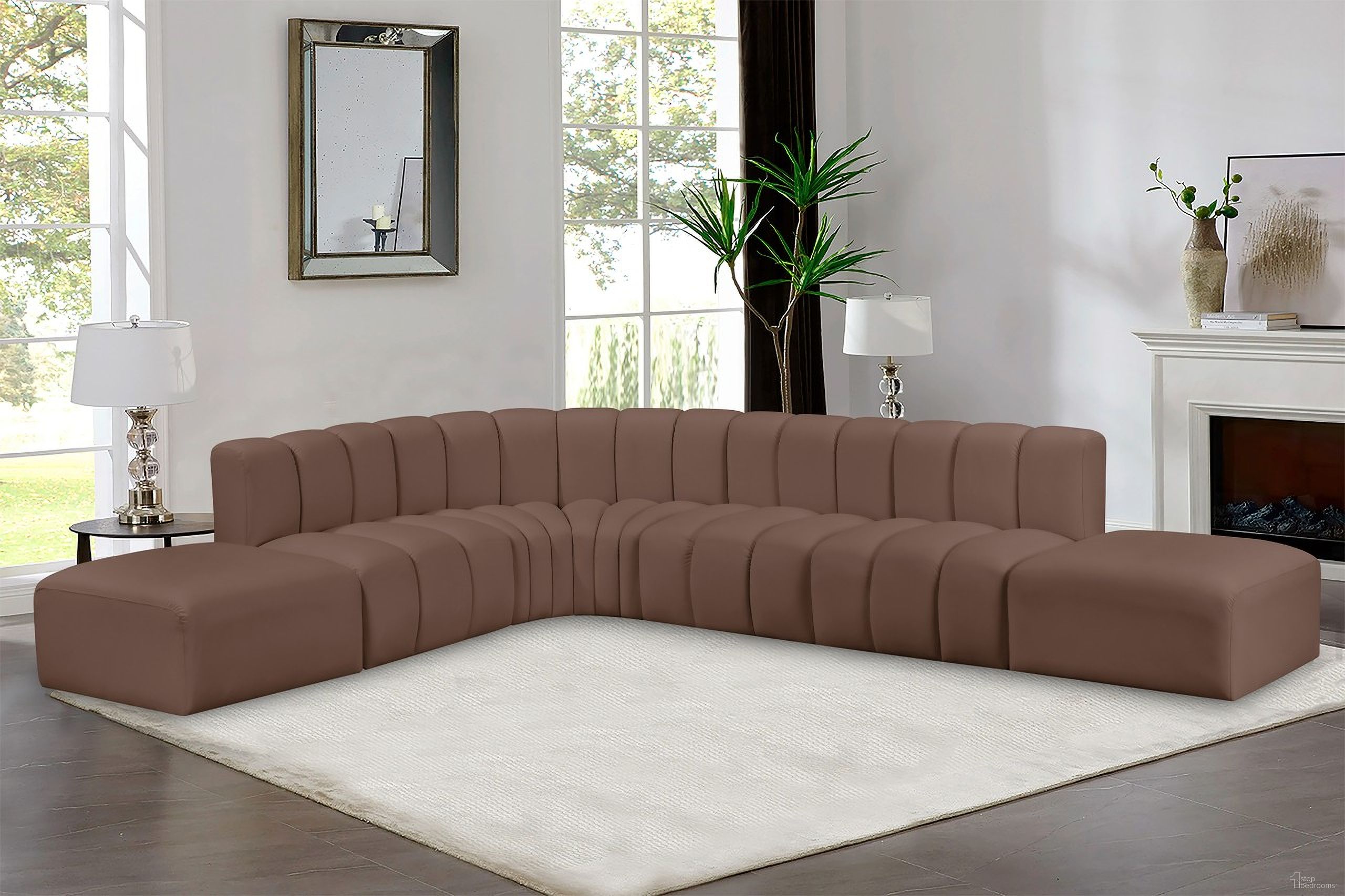 The appearance of Arc Vegan Leather 7 Piece Modular Sofa In Brown designed by Meridian in the modern / contemporary interior design. This brown piece of furniture  was selected by 1StopBedrooms from Arc Collection to add a touch of cosiness and style into your home. Sku: 101Brown-ST;101Brown-ST;101Brown-ST;101Brown-CC;101Brown-CC;101Brown-Ott;101Brown-Ott. Material: Leather. Layout: Modular.