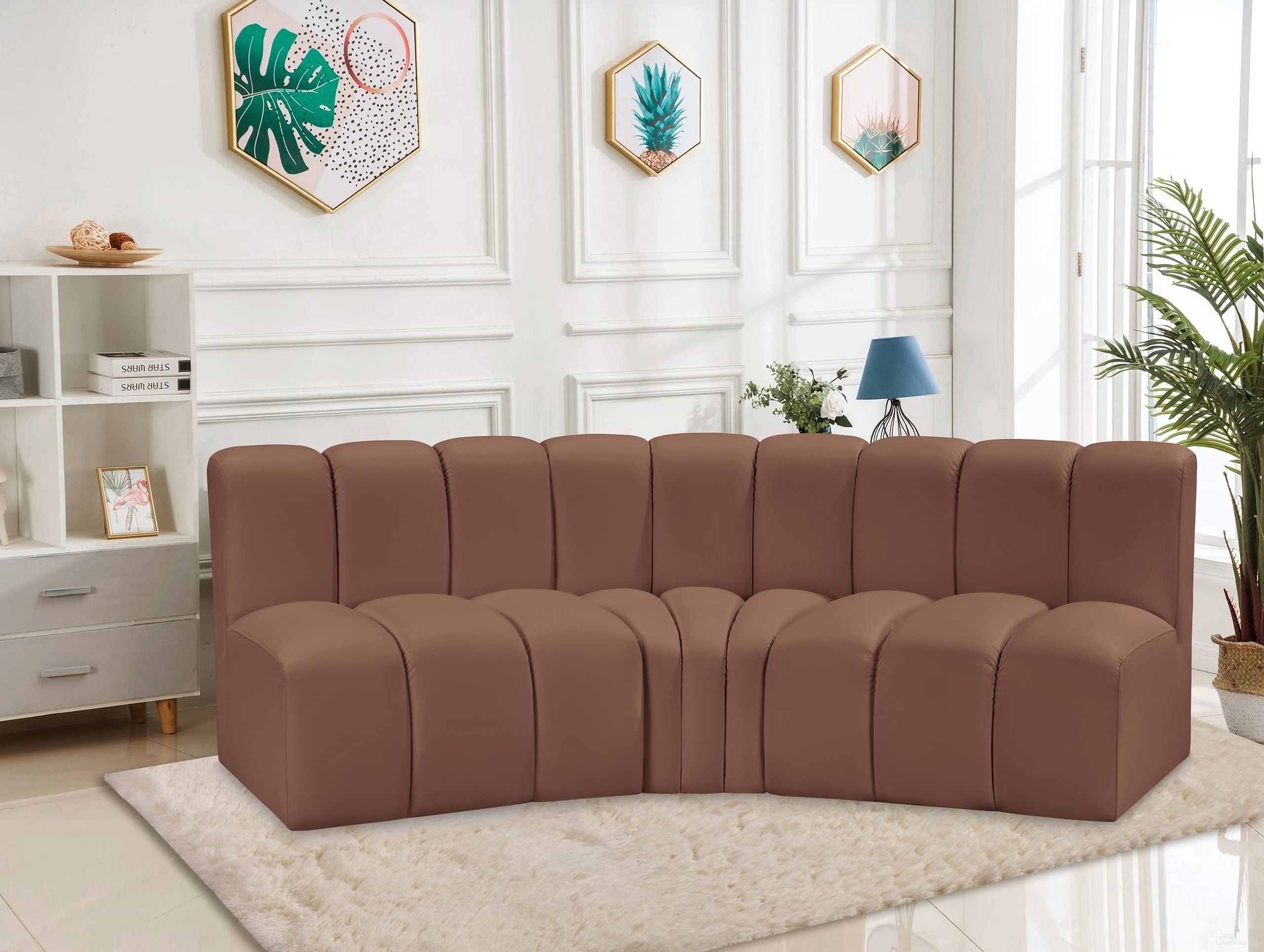 The appearance of Arc Vegan Leather 3 Piece Modular Sofa In Cognac designed by Meridian in the modern / contemporary interior design. This cognac piece of furniture  was selected by 1StopBedrooms from Arc Collection to add a touch of cosiness and style into your home. Sku: 101Cognac-ST;101Cognac-ST;101Cognac-CC. Material: Leather. Layout: Modular.