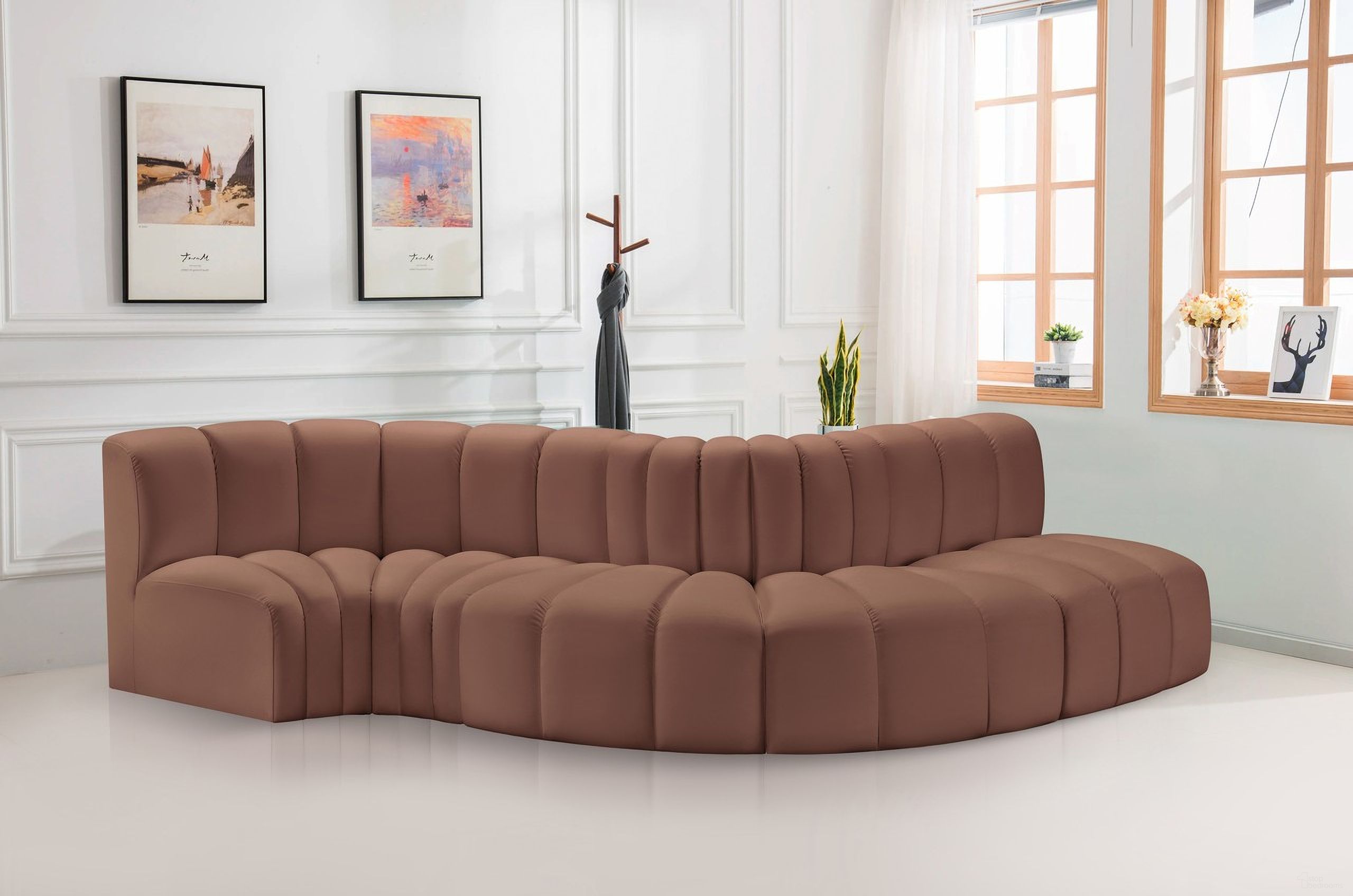 The appearance of Arc Vegan Leather 5 Piece Modular Sofa In Cognac designed by Meridian in the modern / contemporary interior design. This cognac piece of furniture  was selected by 1StopBedrooms from Arc Collection to add a touch of cosiness and style into your home. Sku: 101Cognac-ST;101Cognac-CC;101Cognac-CC;101Cognac-RC;101Cognac-RC. Material: Leather. Layout: Modular.