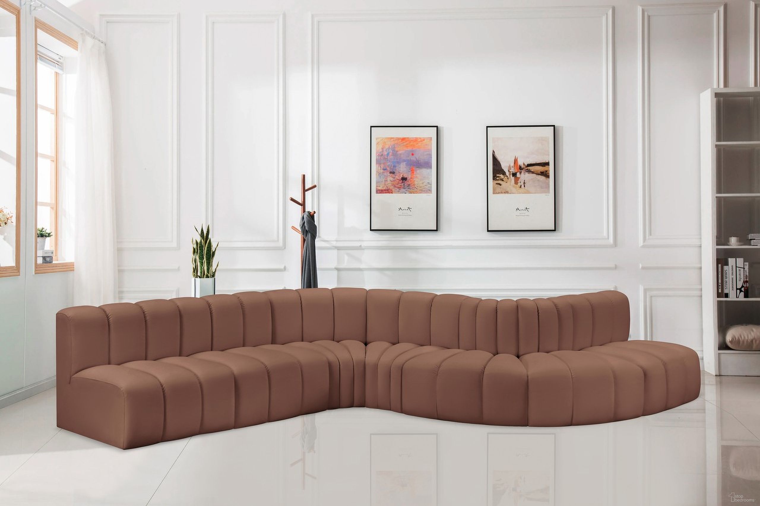 The appearance of Arc Vegan Leather 7 Piece Modular Sofa In Cognac designed by Meridian in the modern / contemporary interior design. This cognac piece of furniture  was selected by 1StopBedrooms from Arc Collection to add a touch of cosiness and style into your home. Sku: 101Cognac-ST;101Cognac-ST;101Cognac-ST;101Cognac-CC;101Cognac-CC;101Cognac-RC;101Cognac-RC. Material: Leather. Layout: Modular.