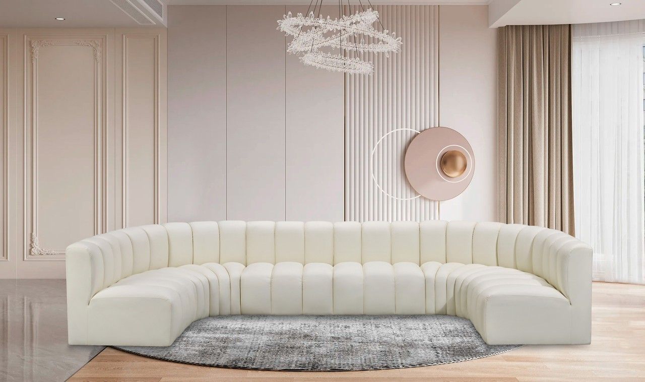 The appearance of Arc Vegan Leather 8 Piece Modular Sofa In Cream designed by Meridian in the modern / contemporary interior design. This cream piece of furniture was selected by 1StopBedrooms from Arc Collection to add a touch of cosiness and style into your home. Sku: 101Cream-ST;101Cream-ST;101Cream-ST;101Cream-ST;101Cream-CC;101Cream-CC;101Cream-CC;101Cream-CC. Material: Leather. Layout: Modular.