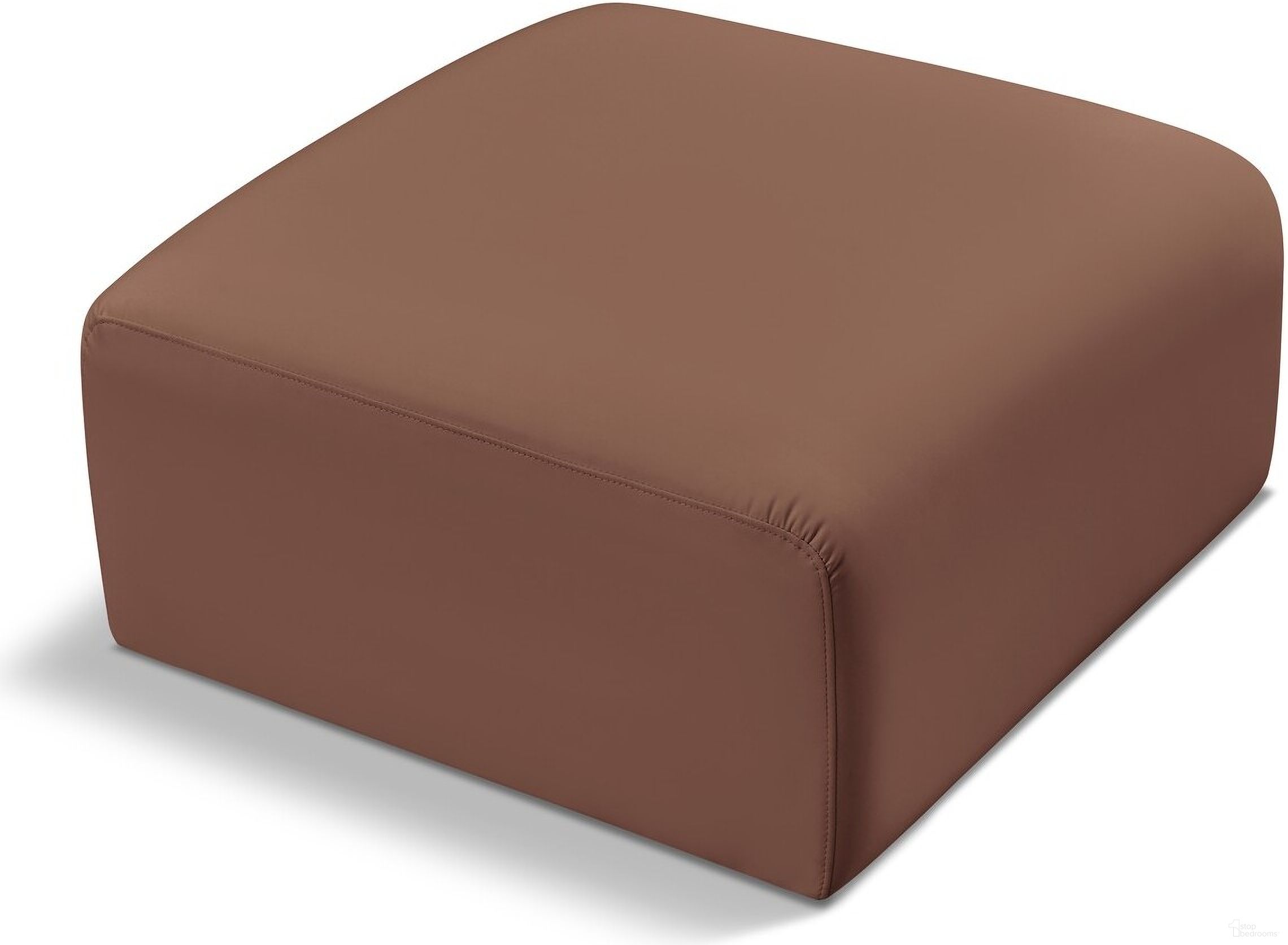 The appearance of Arc Vegan Leather Ottoman In Cognac designed by Meridian in the modern / contemporary interior design. This cognac piece of furniture  was selected by 1StopBedrooms from Arc Collection to add a touch of cosiness and style into your home. Sku: 101Cognac-Ott. Material: Plywood.