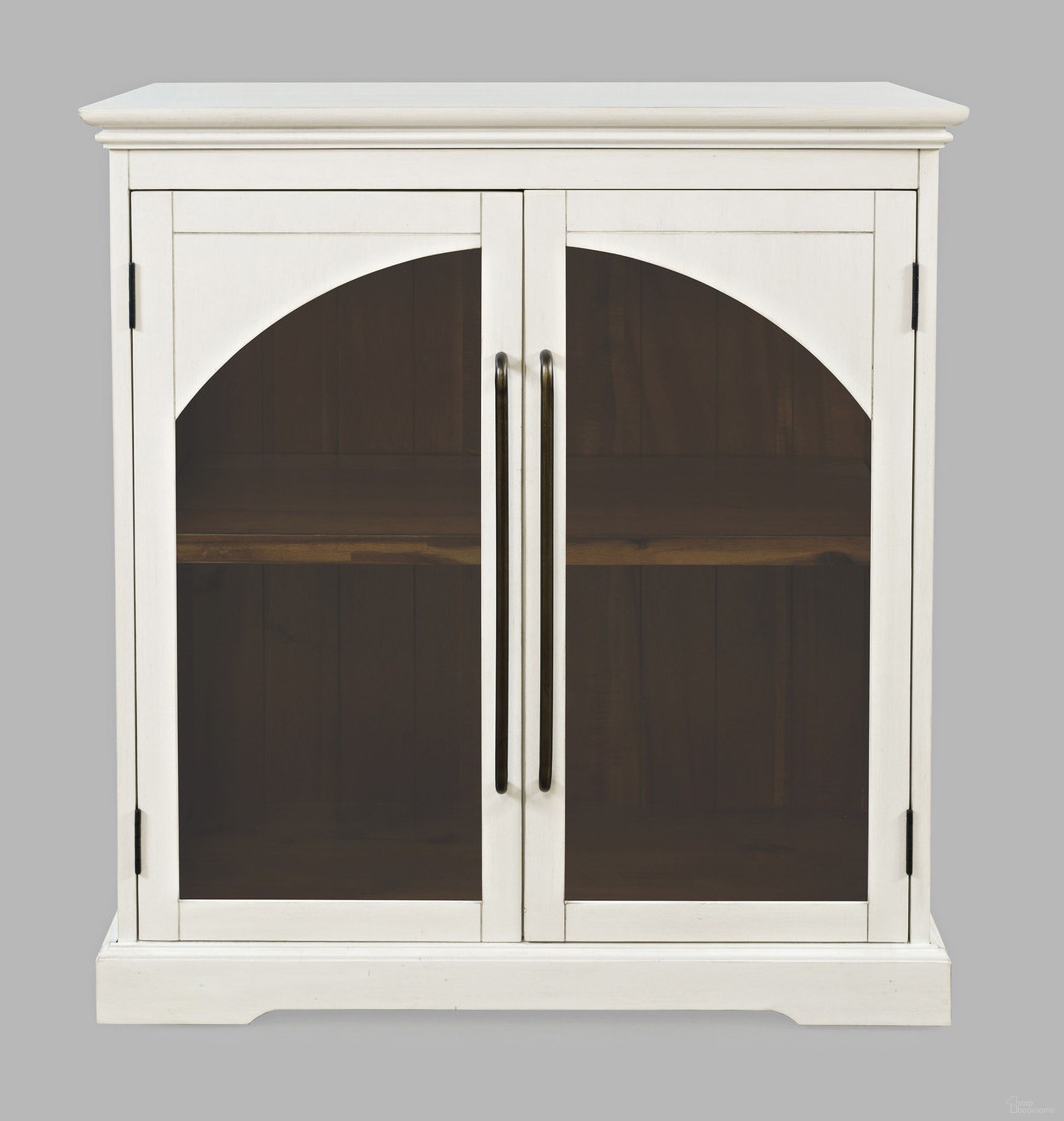 The appearance of Archdale 33 Inch Gothic Arch Accent Storage Cabinet with Glass Doors In White designed by Jofran in the modern / contemporary interior design. This white piece of furniture was selected by 1StopBedrooms from Archdale Collection to add a touch of cosiness and style into your home. Sku: 2293-33. Material: Acacia.