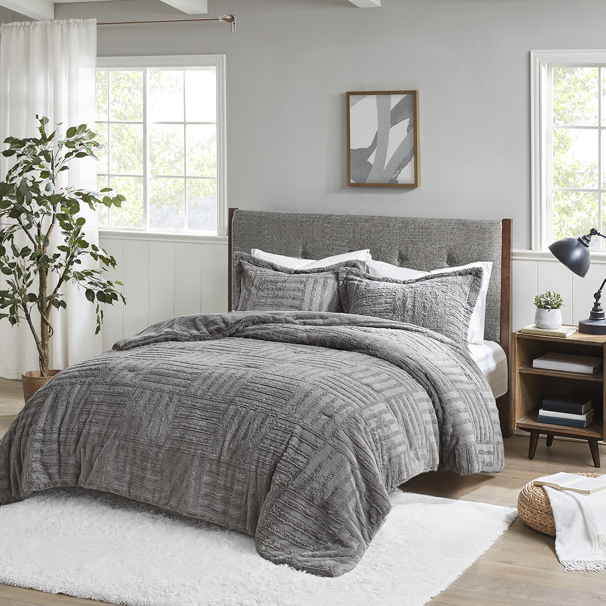 The appearance of Arctic Polyester Checkboard Brushed Long Fur Queen Comforter Mini Set In Grey designed by Olliix in the transitional interior design. This grey piece of furniture was selected by 1StopBedrooms from Arctic Collection to add a touch of cosiness and style into your home. Sku: BASI10-0408. Bed Size: Queen. Material: Fur.