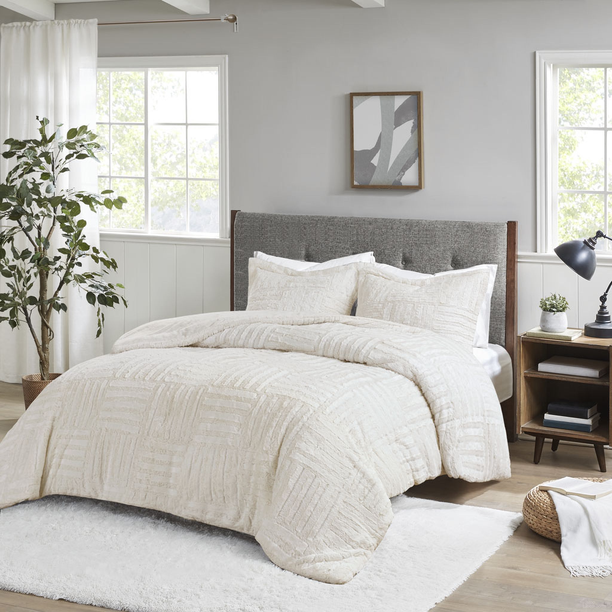 The appearance of Arctic Polyester Checkboard Brushed Long Fur Queen Comforter Mini Set In Ivory designed by Olliix in the transitional interior design. This ivory piece of furniture was selected by 1StopBedrooms from Arctic Collection to add a touch of cosiness and style into your home. Sku: BASI10-0254. Bed Size: Queen. Material: Fur.