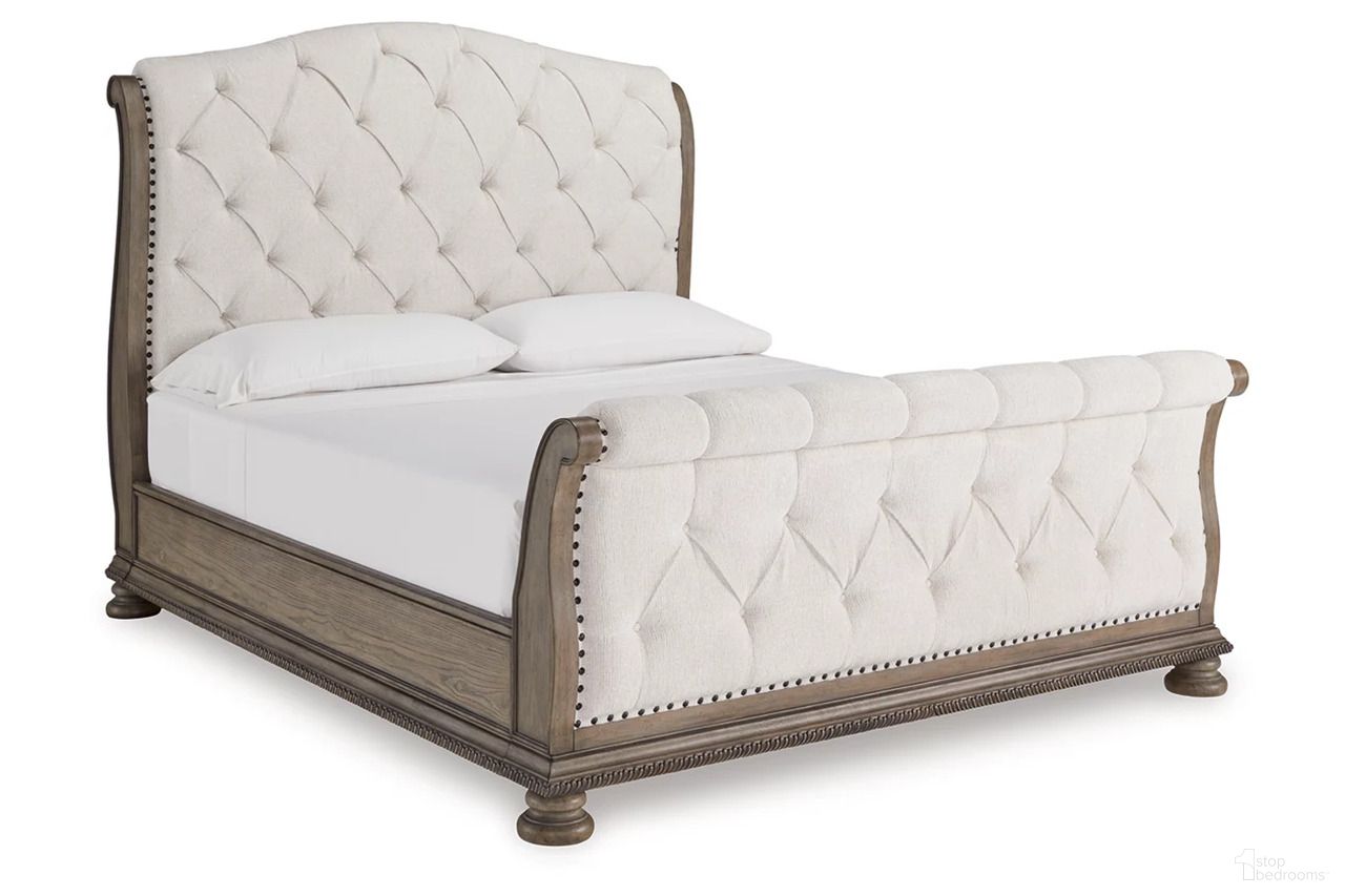 The appearance of Ardenfield California King Upholstered Sleigh Bed In Light Brown designed by Signature Design by Ashley in the traditional interior design. This light brown piece of furniture was selected by 1StopBedrooms from Ardenfield Collection to add a touch of cosiness and style into your home. Sku: B944-56;B944-58;B944-94. Bed Type: Sleigh Bed. Material: Fabric. Bed Size: California King.