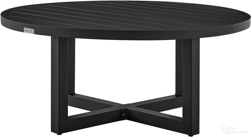 The appearance of Argiope Outdoor Patio Round Coffee Table In Black Aluminum designed by Armen Living in the modern / contemporary interior design. This black piece of furniture  was selected by 1StopBedrooms from Argiope Collection to add a touch of cosiness and style into your home. Sku: 840254332553. Table Top Shape: Round. Material: Aluminum.