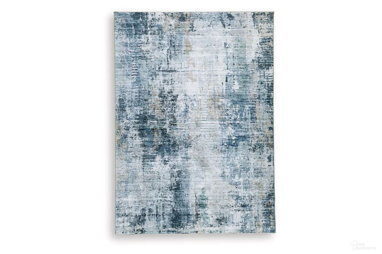The appearance of Arlenmont 5' x 7' Area Rug In Blue/White/Brown designed by Signature Design by Ashley in the modern / contemporary interior design. This blue/white/brown piece of furniture was selected by 1StopBedrooms from Arlenmont Collection to add a touch of cosiness and style into your home. Sku: R407482. Material: Polyester.