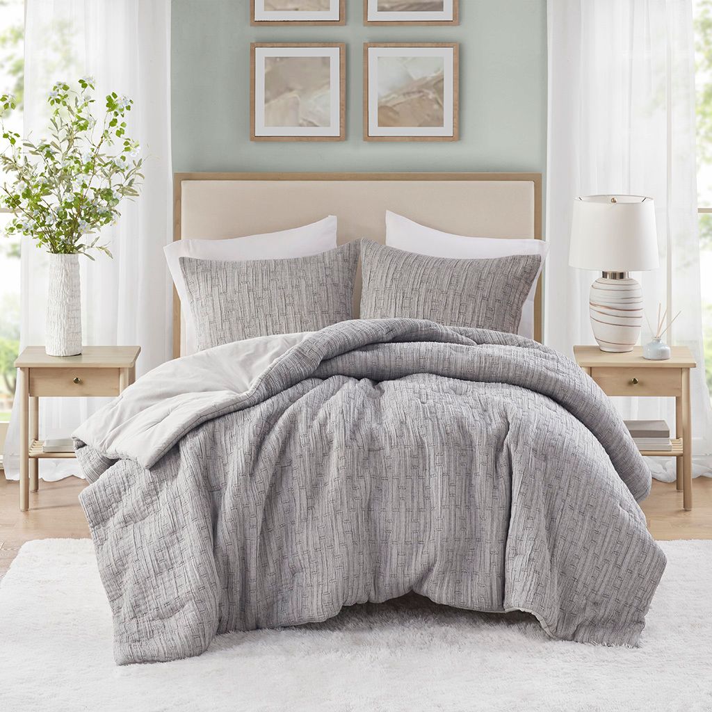 The appearance of Arlo Oversized Comforter Set In Charcoal designed by Olliix in the modern / contemporary interior design. This charcoal piece of furniture was selected by 1StopBedrooms from Arlo Collection to add a touch of cosiness and style into your home. Sku: CH10-012. Bed Size: King. Material: Cotton.