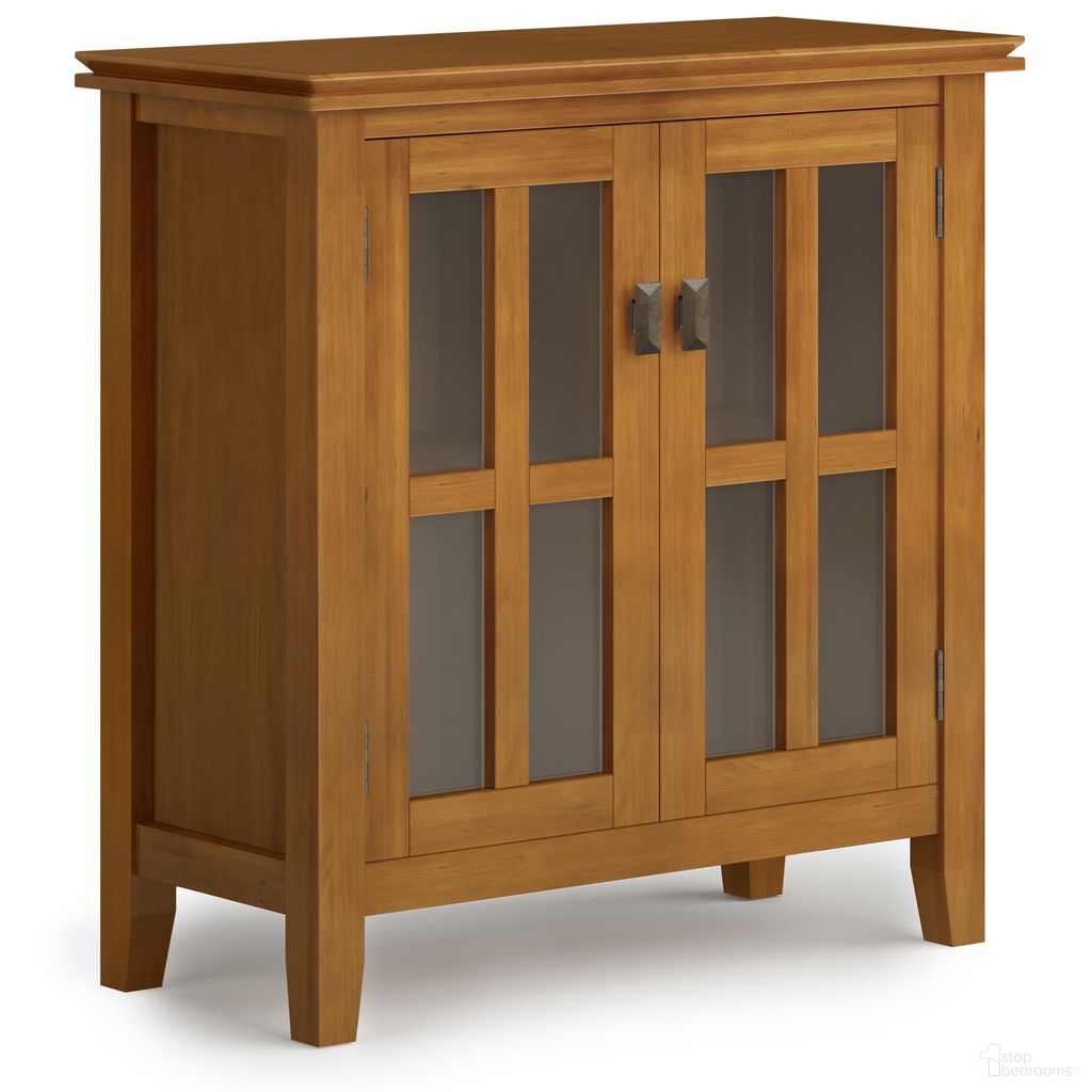 The appearance of Artisan Solid Wood Low Storage Cabinet In Honey Brown designed by Simpli Home in the modern / contemporary interior design. This honey brown piece of furniture  was selected by 1StopBedrooms from Artisan Collection to add a touch of cosiness and style into your home. Sku: AXCART14-HB. Material: Pine.