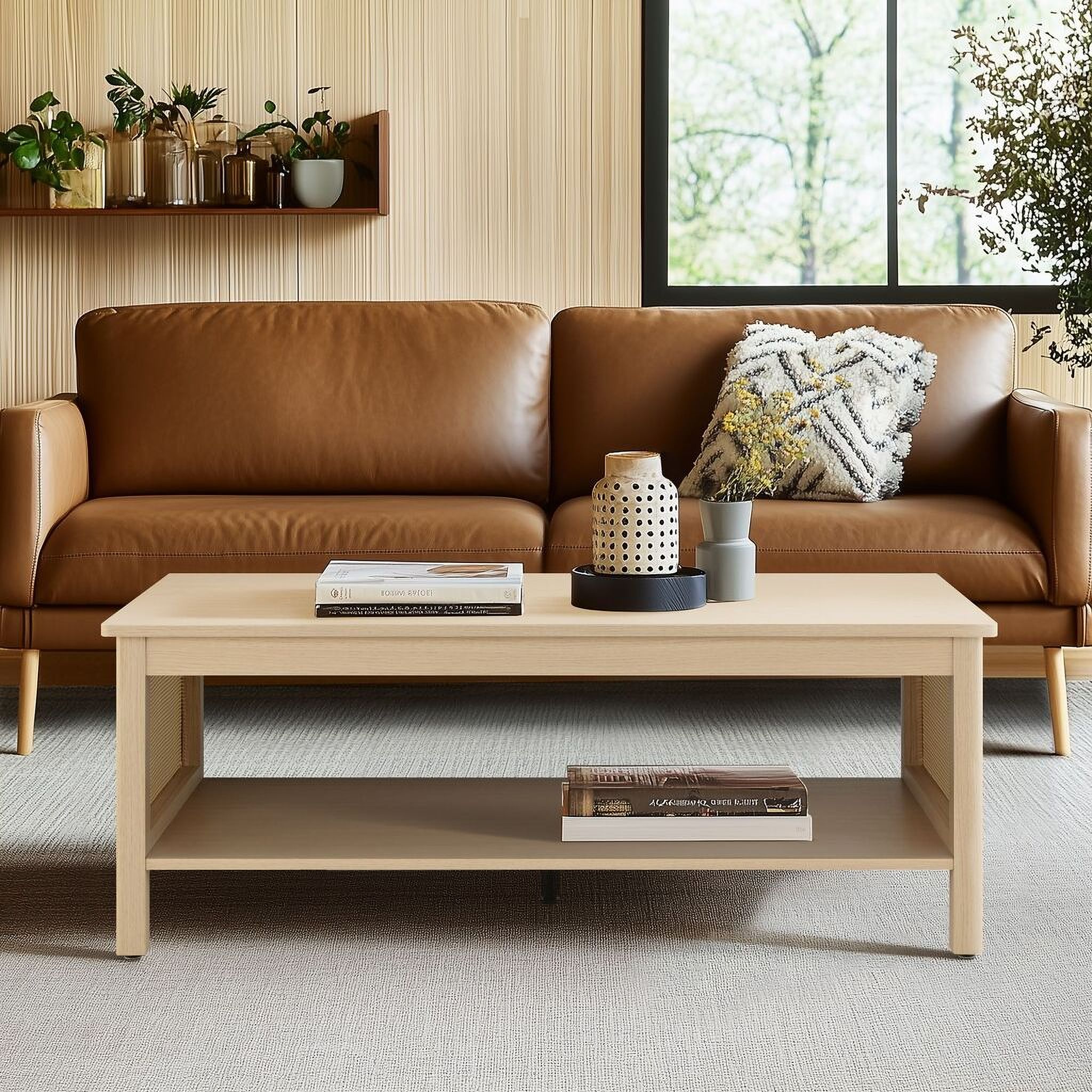 The appearance of Ashlyn 2-Tier Coffee Table with Rattan Sides and Spacious Open Shelf Storage In Natural designed by Olliix in the transitional interior design. This natural piece of furniture was selected by 1StopBedrooms from Ashlyn Collection to add a touch of cosiness and style into your home. Sku: FUR120-0054. Material: Wood.