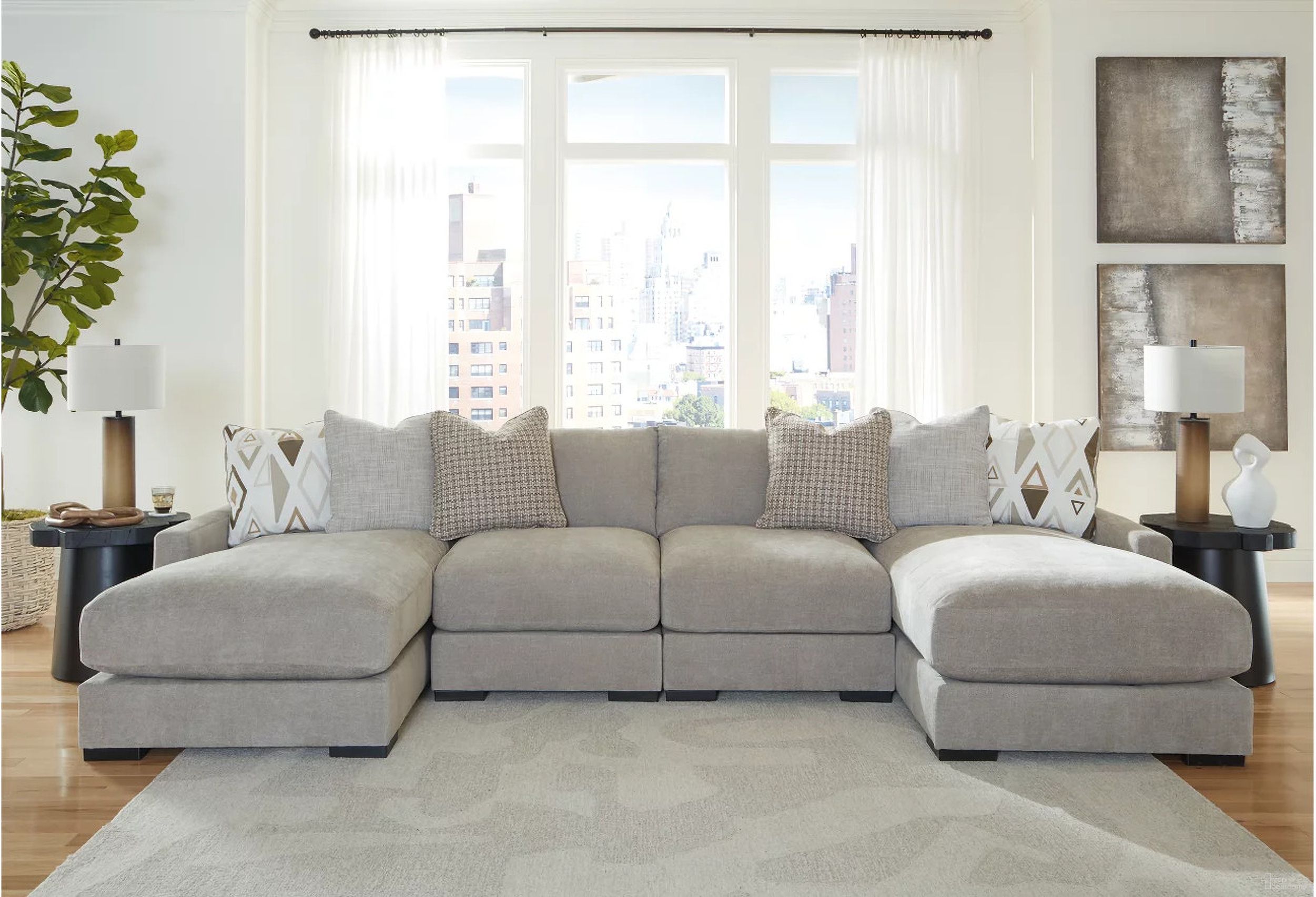 The appearance of Aslan Court 4-Piece Sofa Pit Sectional In Pebble designed by Signature Design by Ashley in the modern / contemporary interior design. This pebble piece of furniture was selected by 1StopBedrooms from Aslan Court Collection to add a touch of cosiness and style into your home. Sku: 2030516;2030546;2030546;2030517. Material: Polyester. Layout: U-Shape.