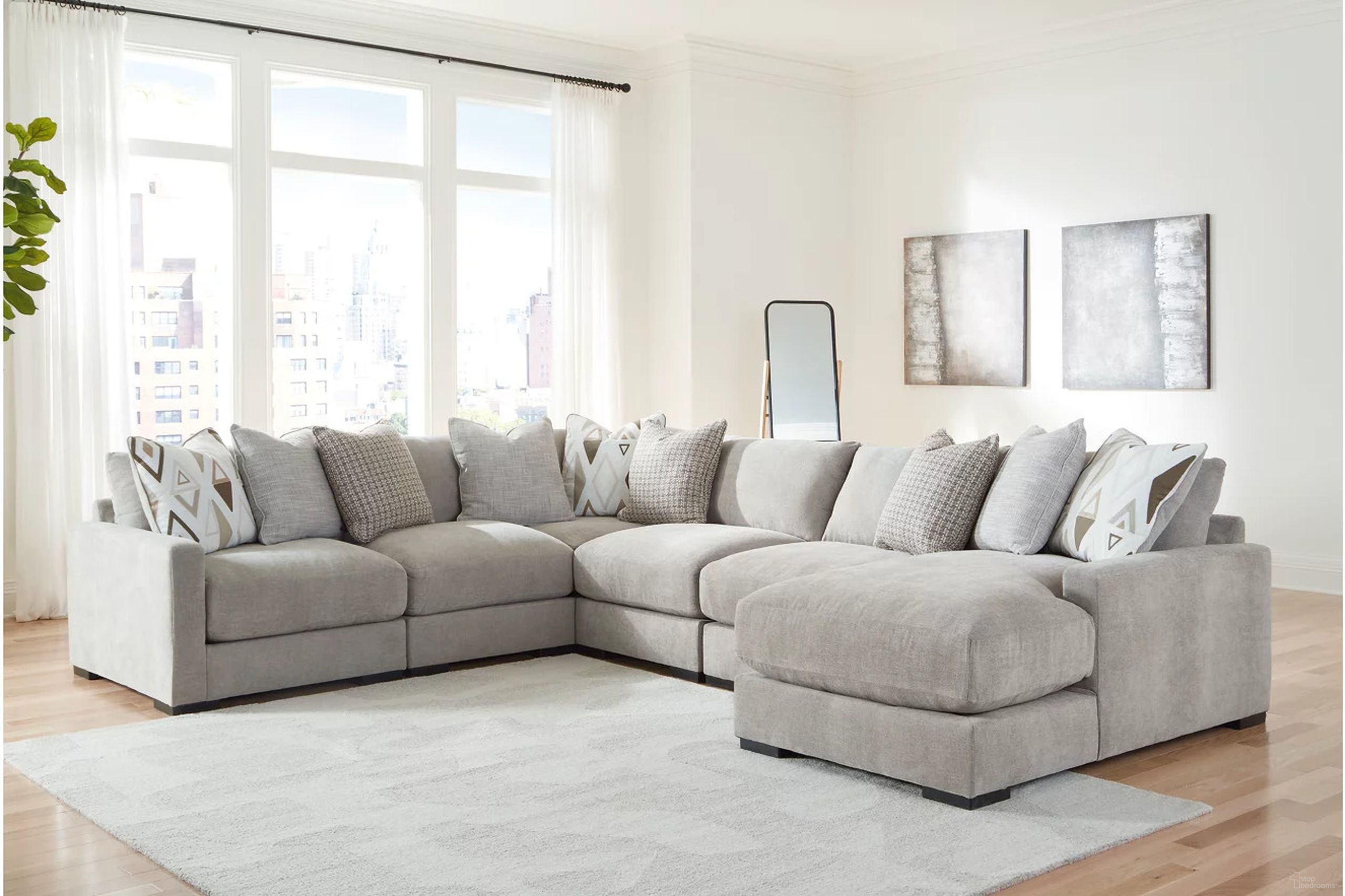 The appearance of Aslan Court 6-Piece Sectional with Chaise In Pebble designed by Signature Design by Ashley in the modern / contemporary interior design. This pebble piece of furniture was selected by 1StopBedrooms from Aslan Court Collection to add a touch of cosiness and style into your home. Sku: 2030564;2030546;2030546;2030546;2030577;2030517. Material: Polyester.