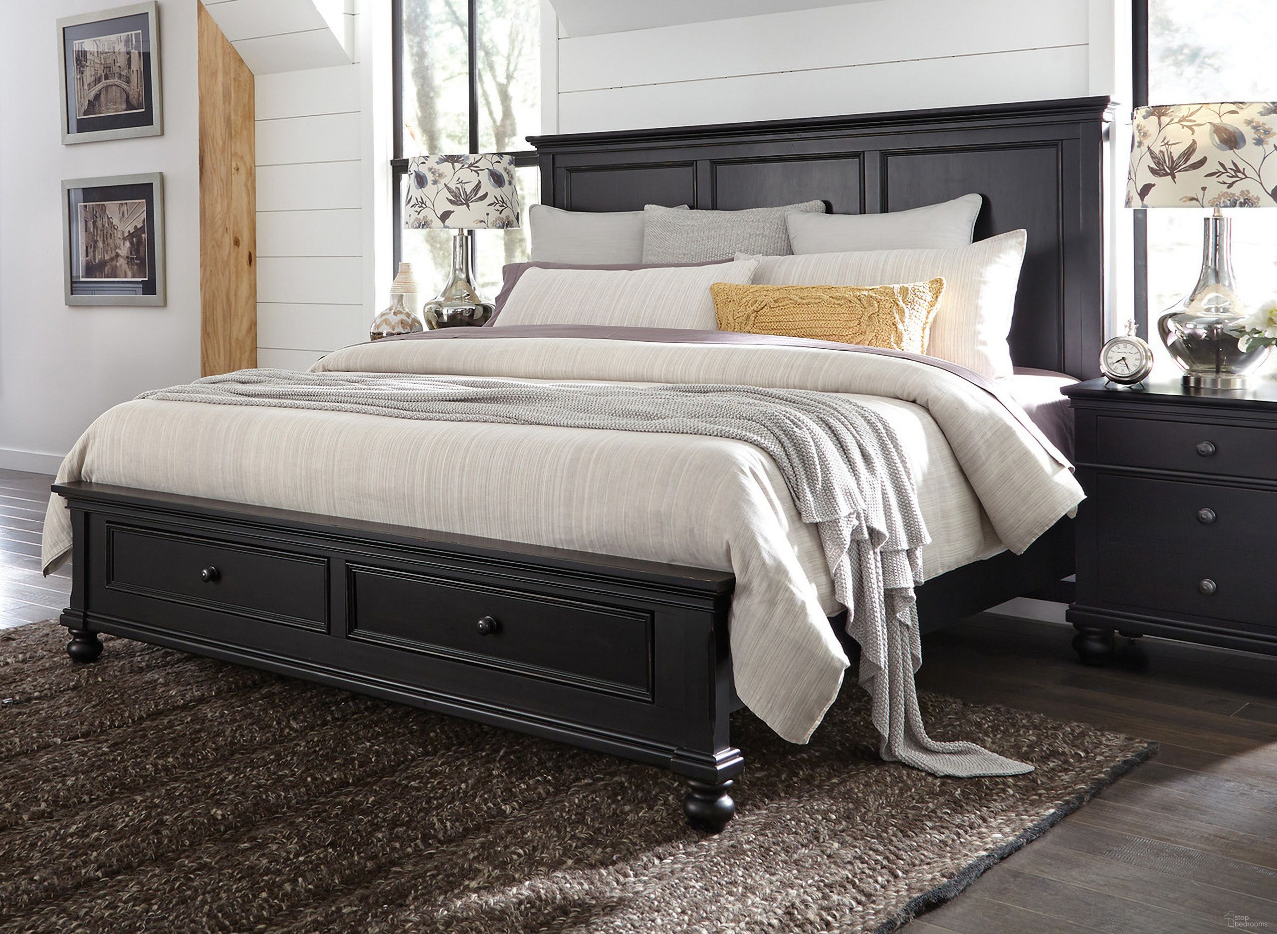The appearance of Aspenhome Oxford Queen Panel Storage Bed In Black designed by Aspenhome in the modern / contemporary interior design. This black piece of furniture  was selected by 1StopBedrooms from Oxford Collection to add a touch of cosiness and style into your home. Sku: I07-412-BLK;I07-403D-BLK;I07-402-BLK. Bed Type: Storage Bed. Material: Wood. Bed Size: Queen.