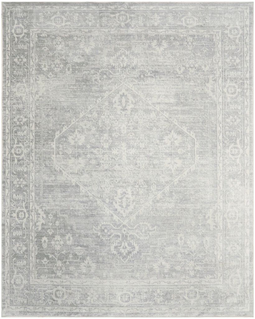 The appearance of Astra Machine Washable 9' x 12' Indoor Rug In Light Grey designed by Nourison in the rustic / southwestern interior design. This light grey piece of furniture  was selected by 1StopBedrooms from Astra Collection to add a touch of cosiness and style into your home. Sku: 841491133484. Material: Polyester.