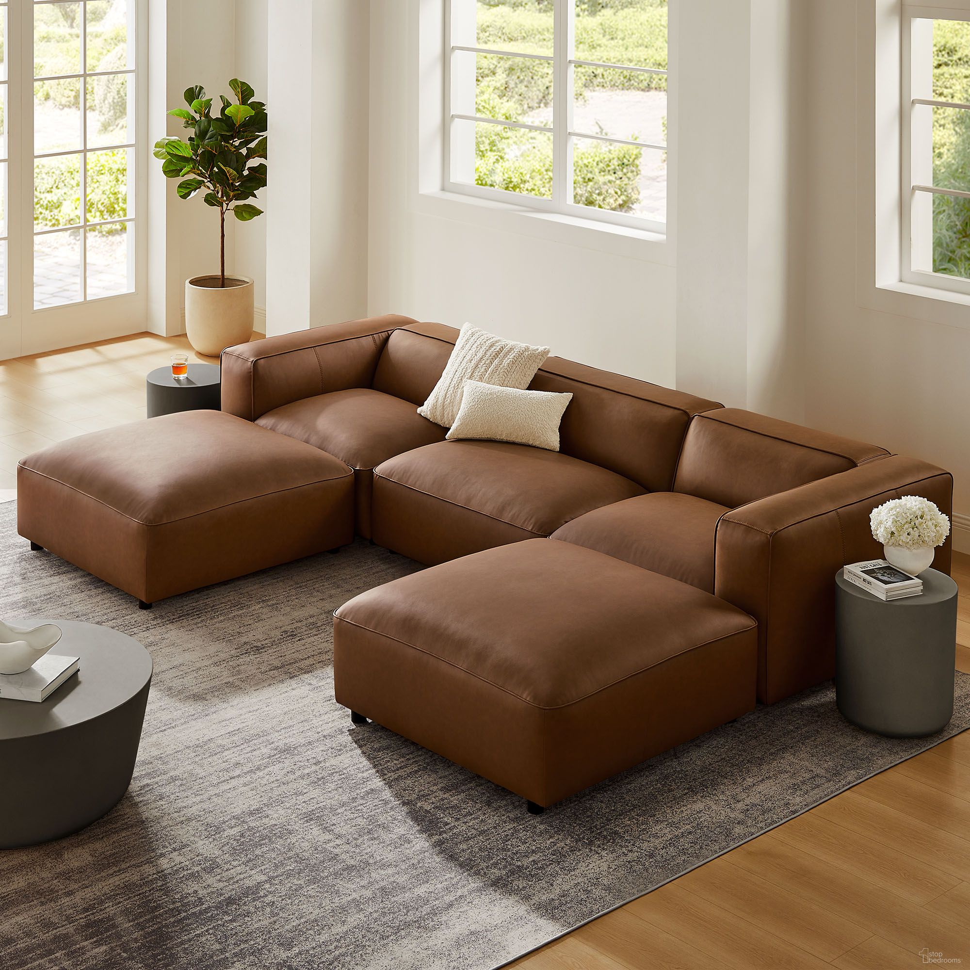 The appearance of Auren 5-Piece Upholstered Vegan Leather Modular U-Shaped Sofa In Coffee designed by Modway in the modern / contemporary interior design. This coffee piece of furniture was selected by 1StopBedrooms from Auren Collection to add a touch of cosiness and style into your home. Sku: EEI-7125-COF;EEI-7125-COF;EEI-7124-COF;EEI-7121-COF;EEI-7122-COF. Material: Leather. Layout: U-Shape.