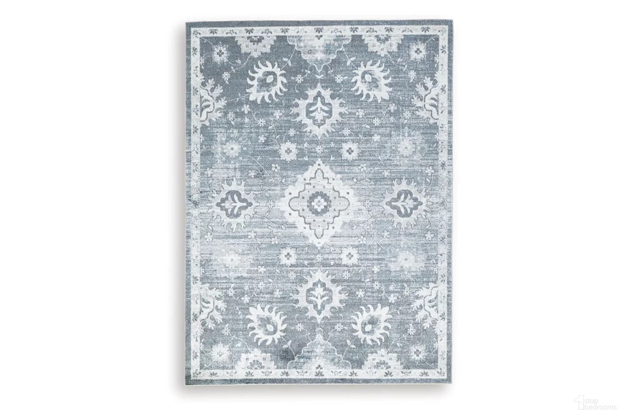 The appearance of Avanworths Washable 7'10" x 10' Area Rug In Blue/Gray/Ivory designed by Signature Design by Ashley in the traditional interior design. This blue/gray/ivory piece of furniture was selected by 1StopBedrooms from Avanworths Collection to add a touch of cosiness and style into your home. Sku: R407791. Material: Polyester.