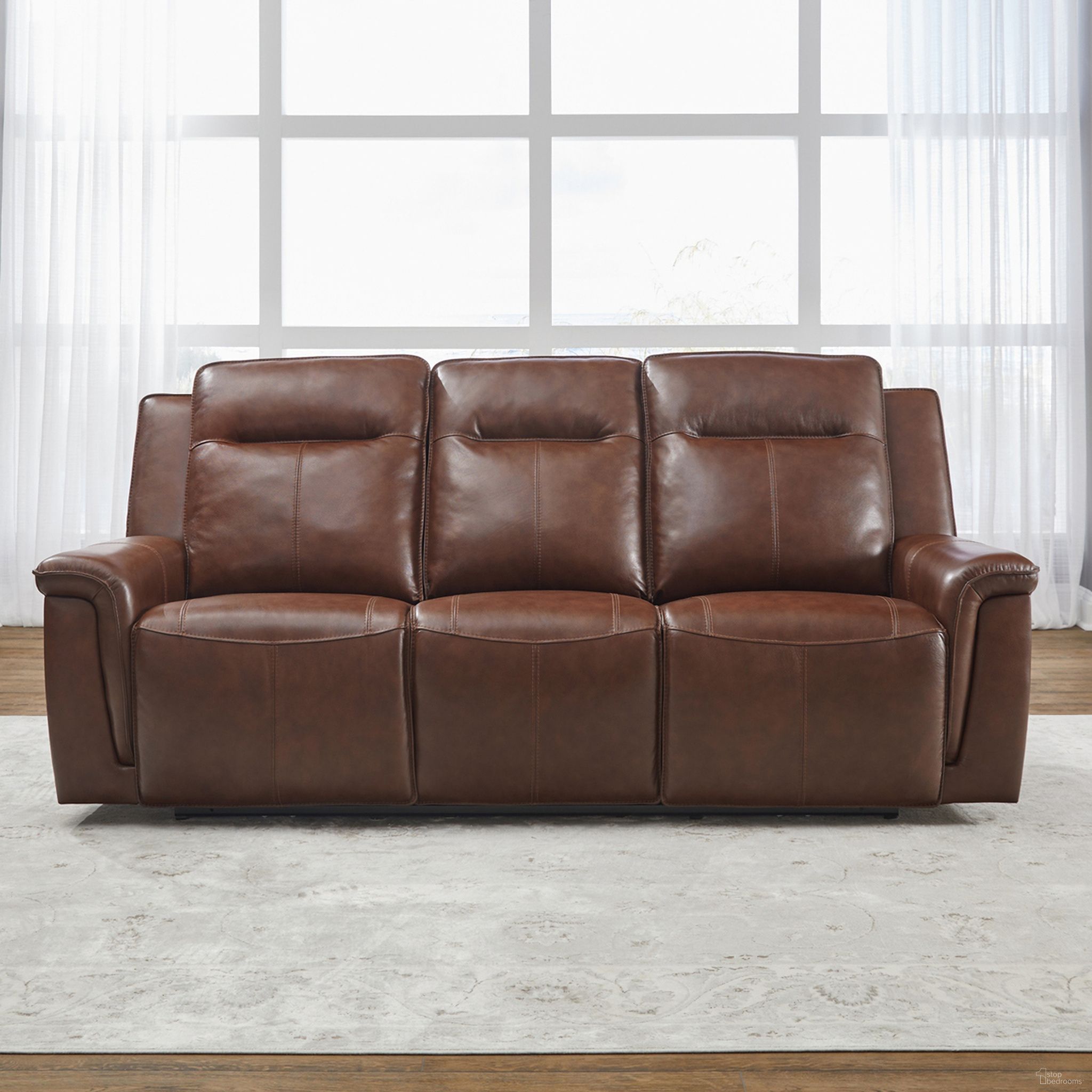 The appearance of Avery Power Reclining Sofa In Cognac designed by Liberty in the transitional interior design. This cognac piece of furniture was selected by 1StopBedrooms from Avery Collection to add a touch of cosiness and style into your home. Sku: 7001CG-32P. Material: Wood.