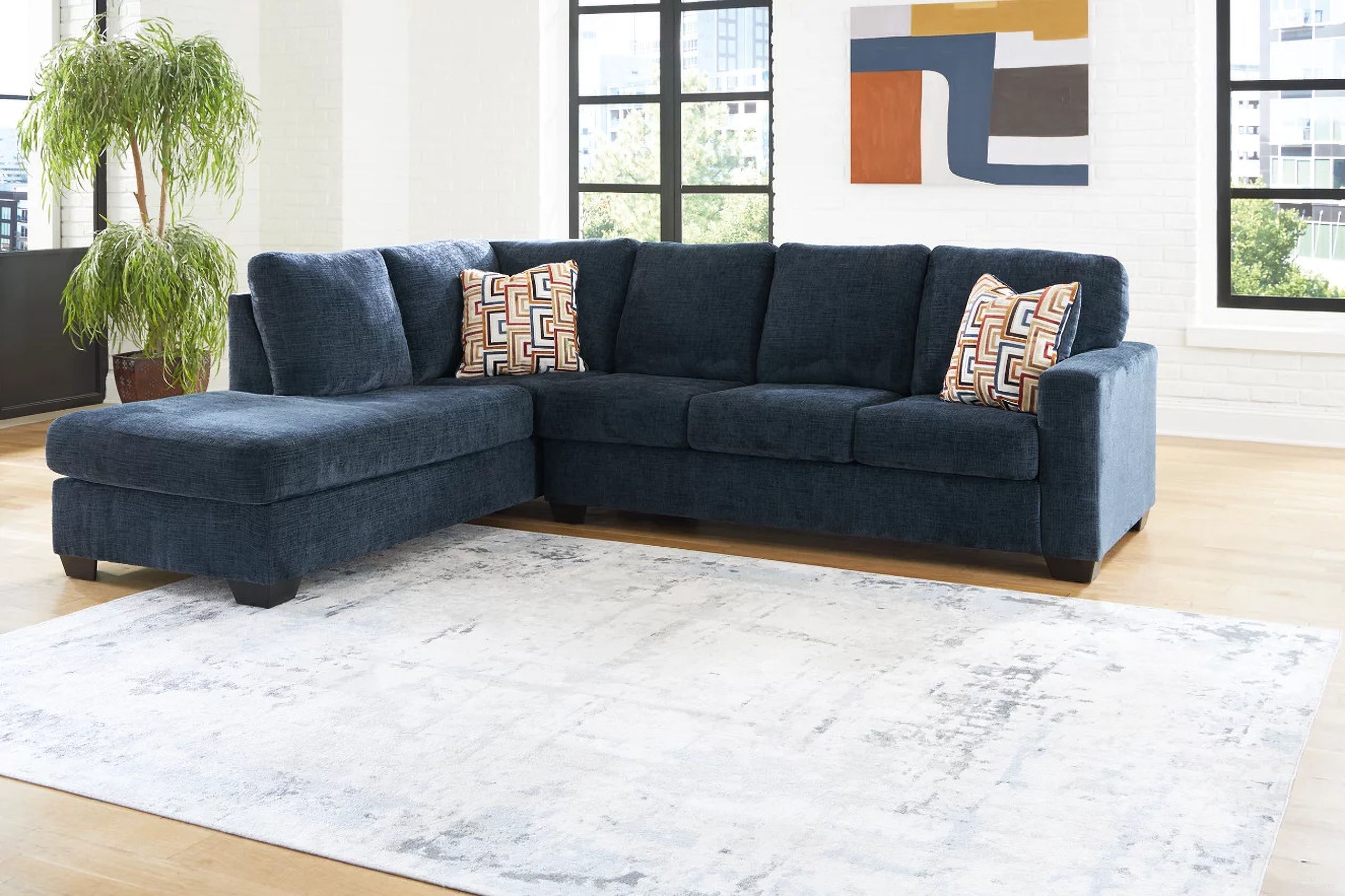 The appearance of Aviemore 2-Piece Sectional With LAF Chaise In Ink designed by Signature Design by Ashley in the transitional interior design. This ink piece of furniture was selected by 1StopBedrooms from Aviemore Collection to add a touch of cosiness and style into your home. Sku: 2430316;2430367. Material: Polyester. Layout: Sofa & Chaise. Orientation: LAF.
