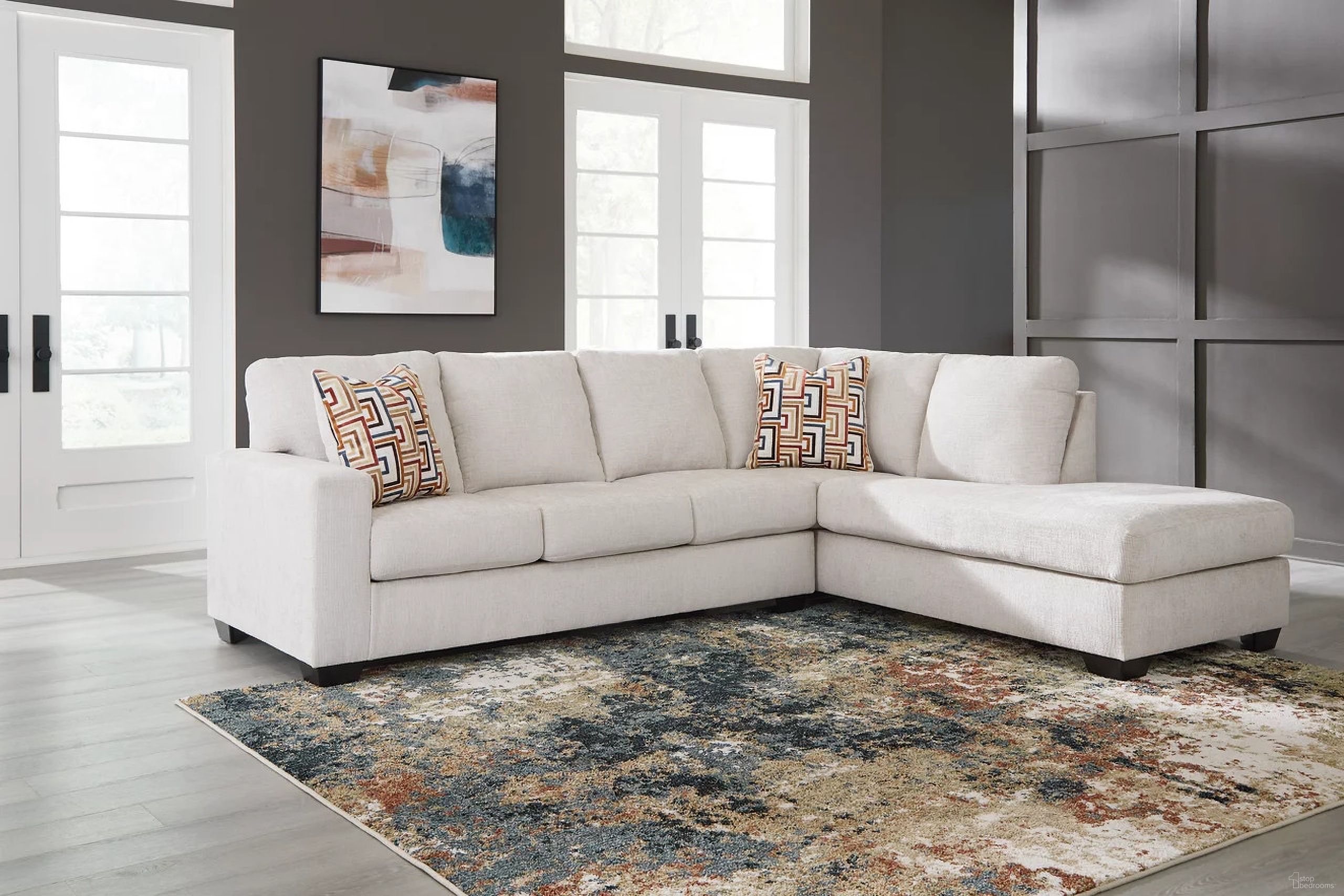 The appearance of Aviemore 2-Piece Sectional With RAF Chaise In Stone designed by Signature Design by Ashley in the transitional interior design. This stone piece of furniture was selected by 1StopBedrooms from Aviemore Collection to add a touch of cosiness and style into your home. Sku: 2430566;2430517. Material: Polyester. Layout: Sofa & Chaise. Orientation: RAF.
