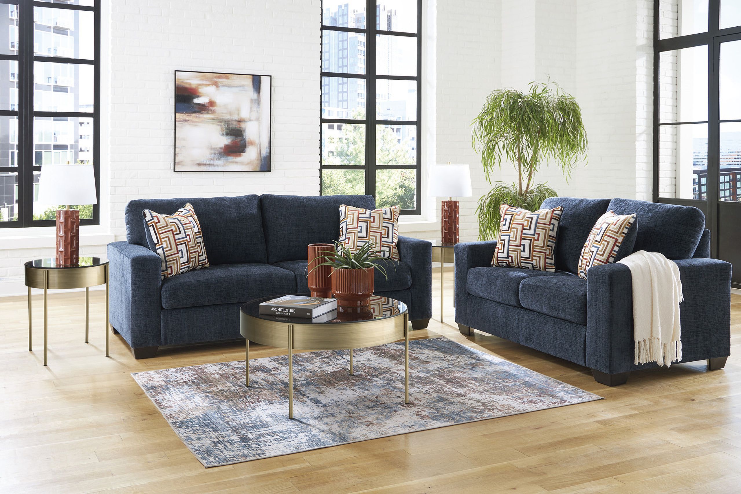 The appearance of Aviemore Living Room Set In Ink designed by Signature Design by Ashley in the modern / contemporary interior design. This ink piece of furniture  was selected by 1StopBedrooms from Aviemore Collection to add a touch of cosiness and style into your home. Sku: 2430338;2430335. Material: Fabric.