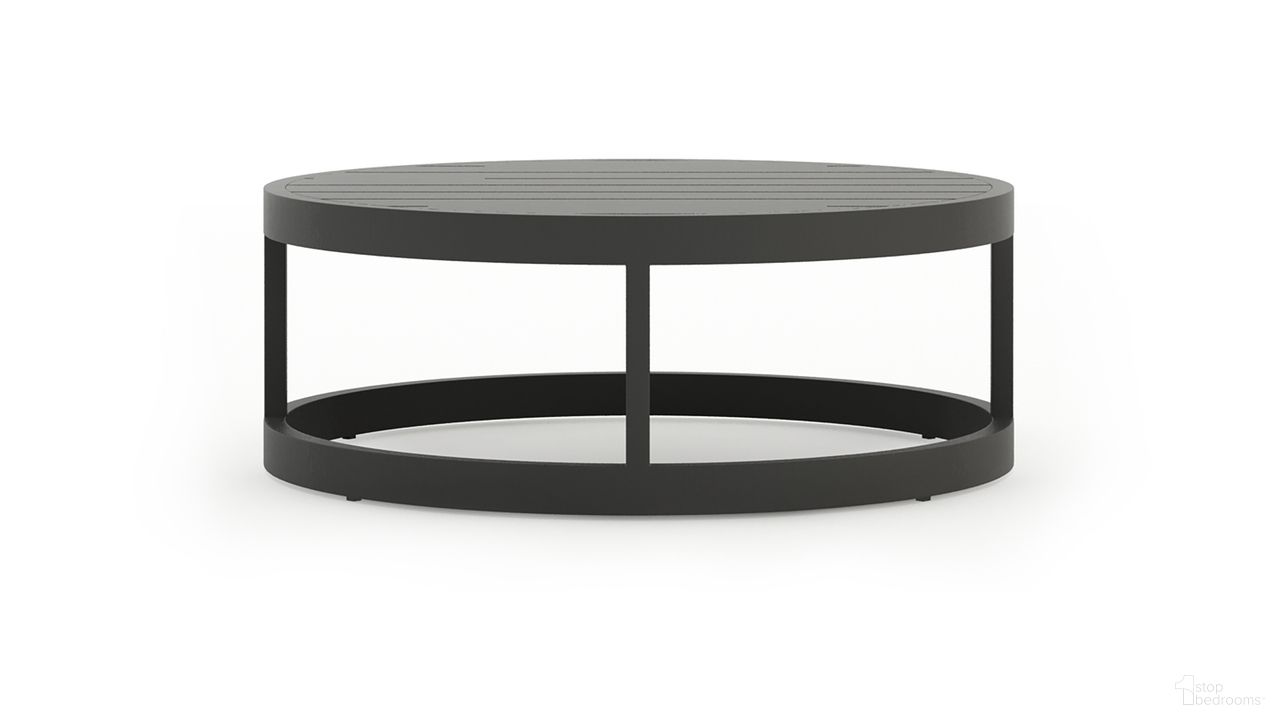 The appearance of Avion Round Coffee Table In Slate designed by Harmonia Living in the transitional interior design. This slate piece of furniture was selected by 1StopBedrooms from Avion Collection to add a touch of cosiness and style into your home. Sku: HL-AVN-SL-RCT. Material: Aluminum.