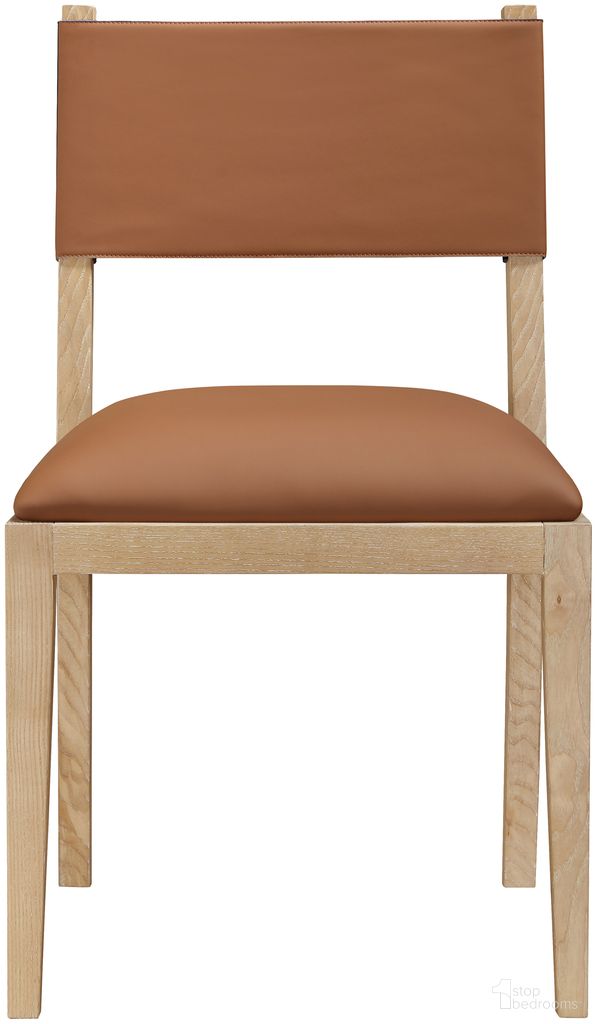 The appearance of Avon Vegan Leather Dining Side Chair Set of 2 In Cognac and Stained Natural designed by Meridian in the modern / contemporary interior design. This cognac/stained natural piece of furniture was selected by 1StopBedrooms from Avon Collection to add a touch of cosiness and style into your home. Sku: 88016Cognac-SC. Material: Vegan Leather. Chair Type: Side Chair.