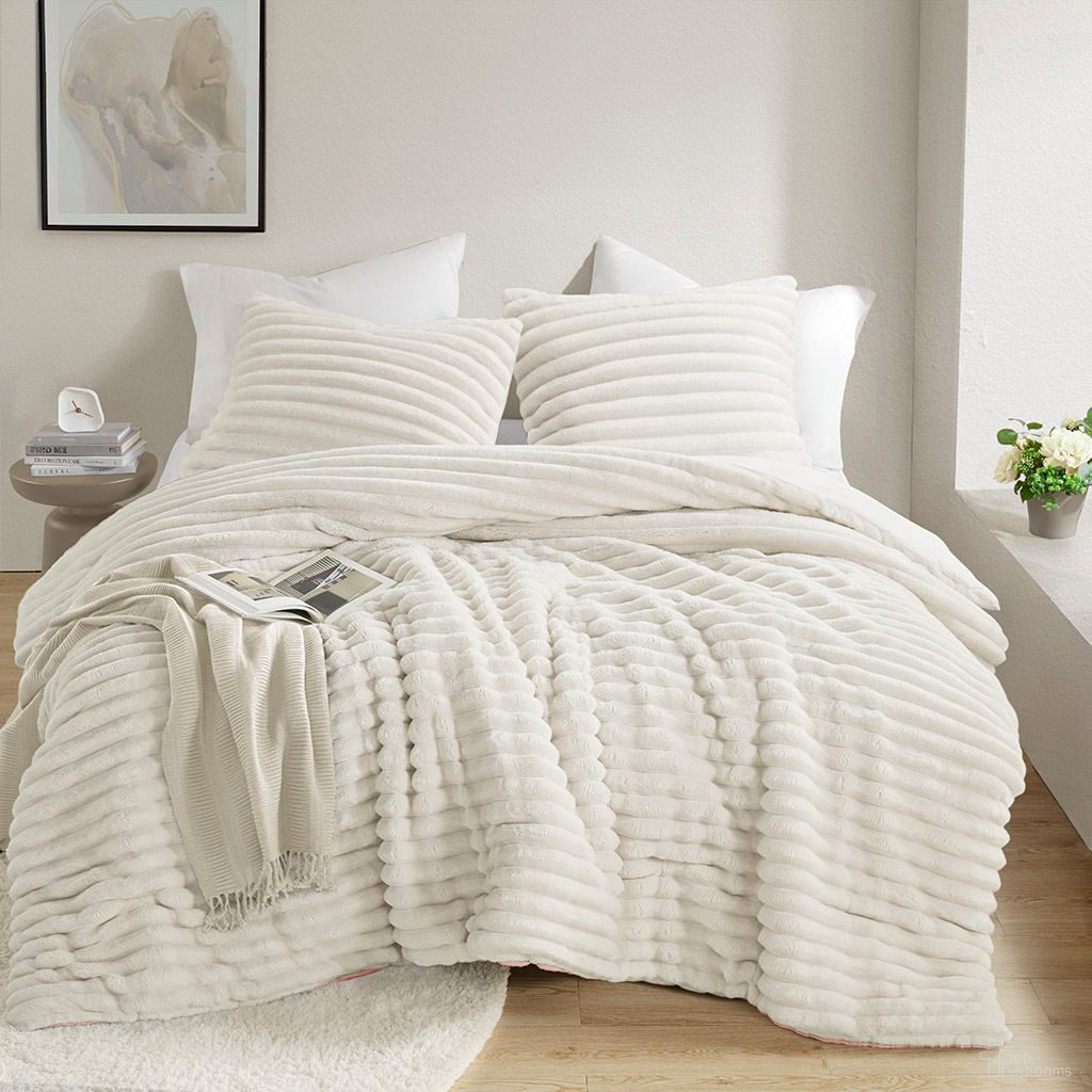 The appearance of Avril Fluffy Ribbed Plush Comforter Set In Ivory designed by Olliix in the transitional interior design. This ivory piece of furniture was selected by 1StopBedrooms from Avril Collection to add a touch of cosiness and style into your home. Sku: AM10-0288. Material: Microfiber. Bed Size: King.