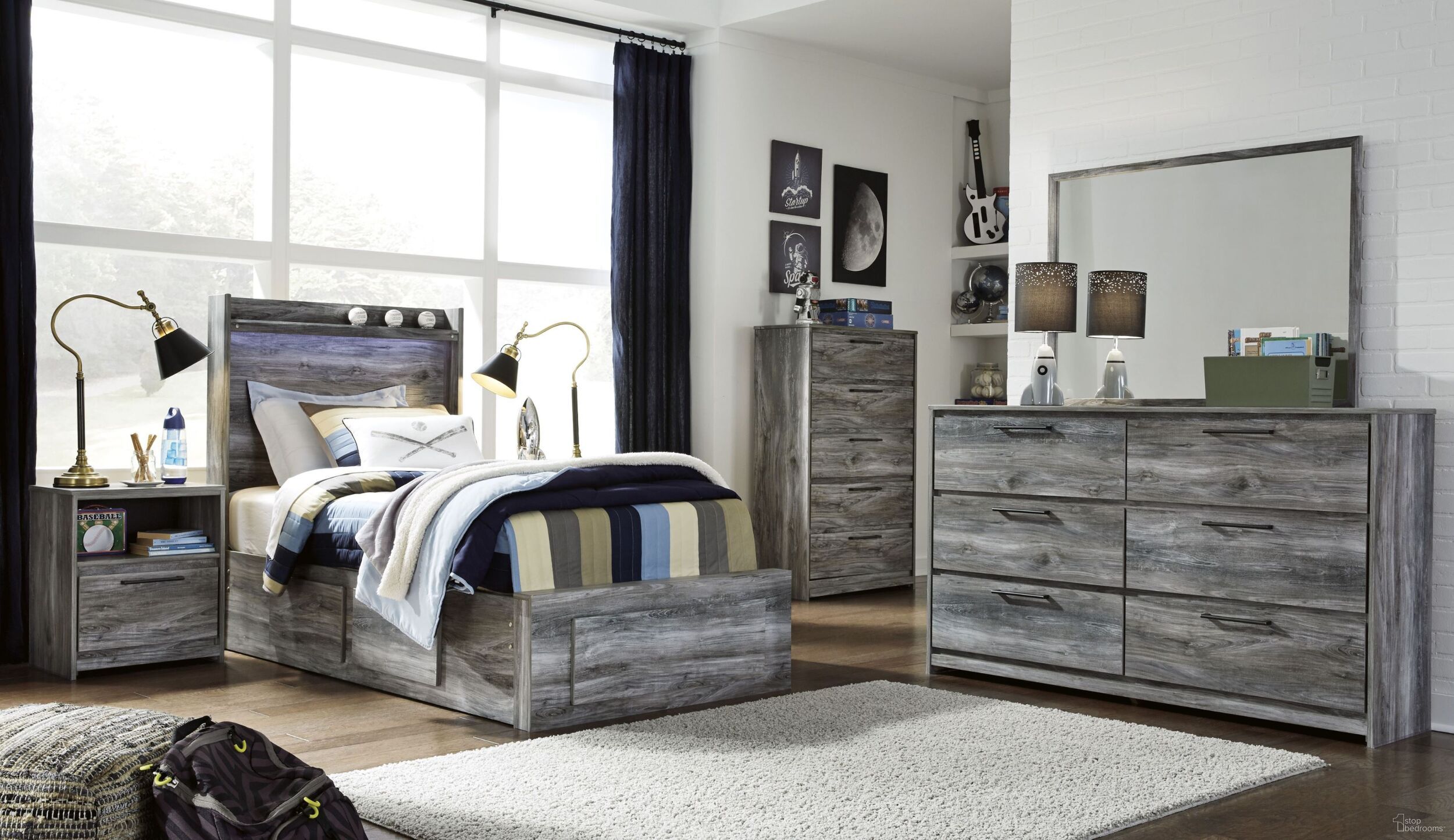 The appearance of Baystorm Gray Youth Double Storage Panel Bedroom Set designed by Signature Design by Ashley in the transitional interior design. This black and brown piece of furniture was selected by 1StopBedrooms from Baystorm Collection to add a touch of cosiness and style into your home. Sku: B221-50;B221-50;B221-52S;B221-53;B100-11;B221-91. Bed Type: Panel Bed. Material: Wood. Bed Size: Twin.