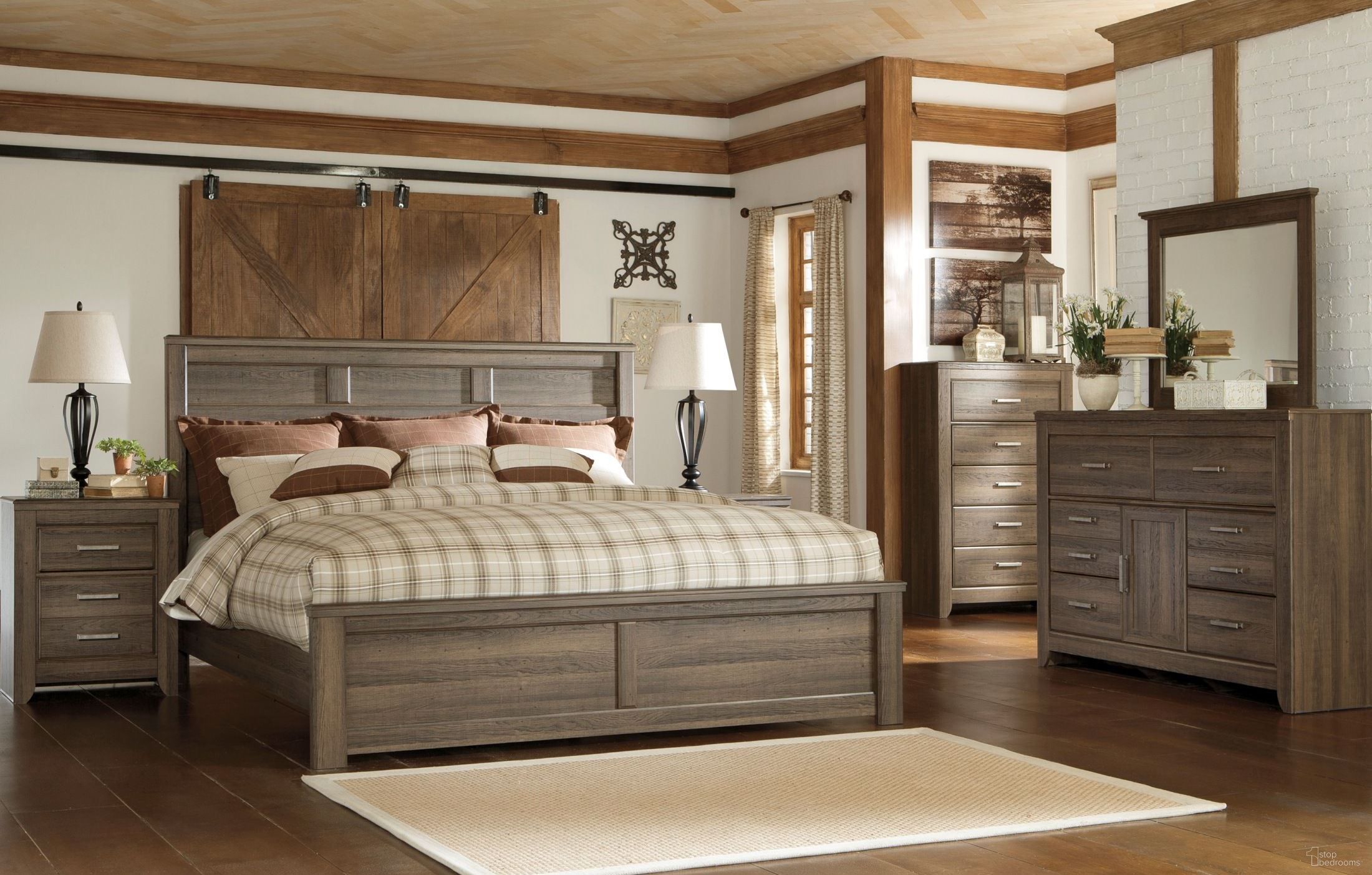 The appearance of Juararo Panel Headboard Set designed by Signature Design by Ashley in the modern / contemporary interior design. This dark brown piece of furniture was selected by 1StopBedrooms from Juararo Collection to add a touch of cosiness and style into your home. Sku: B251-36;B251-31;B251-91;B251-57. Material: Wood. Bed Size: Queen.