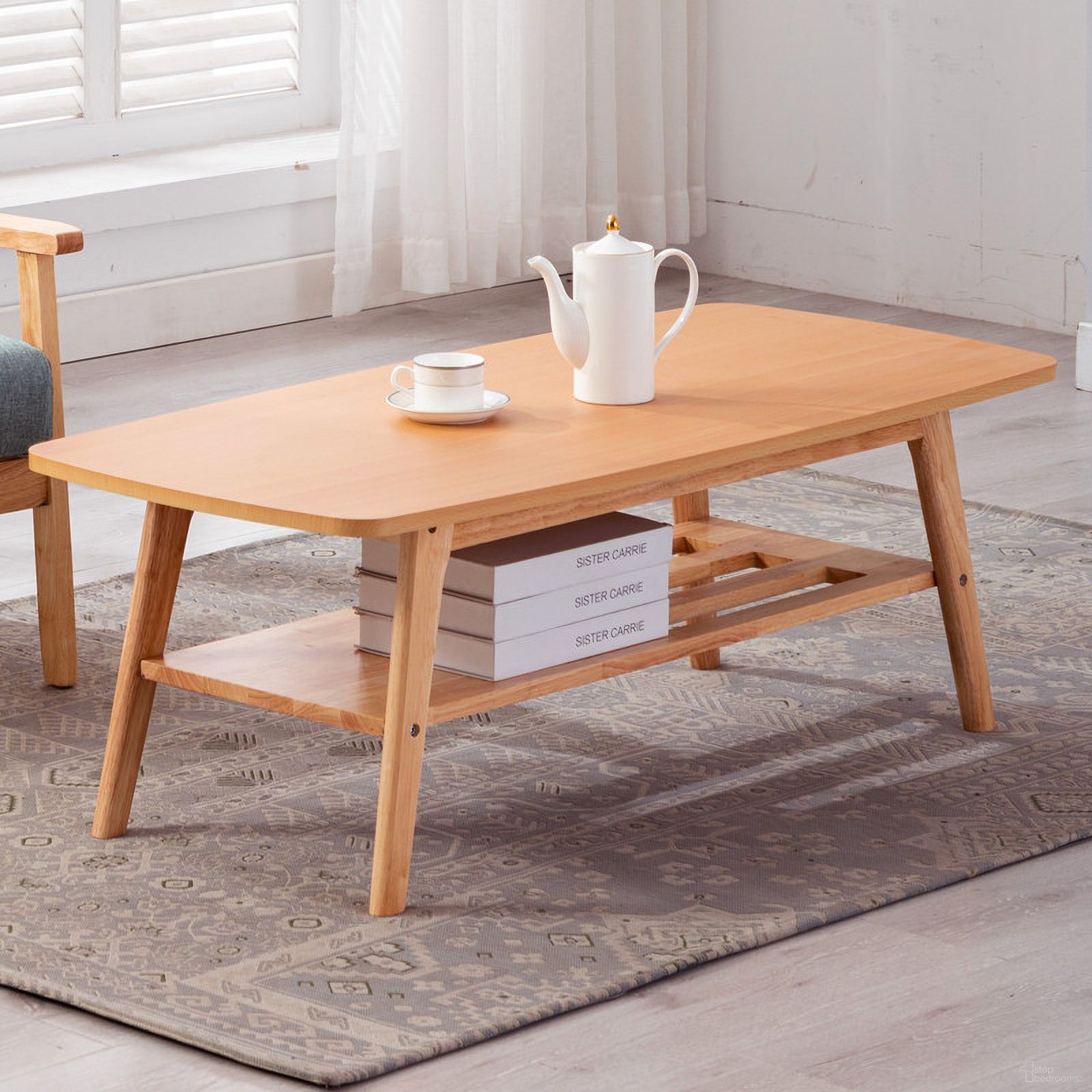 The appearance of Bahamas Natural Light Oak Coffee Table designed by Lilola Home in the transitional interior design. This light oak piece of furniture was selected by 1StopBedrooms from Bahamas Collection to add a touch of cosiness and style into your home. Sku: 98873. Material: MDF.