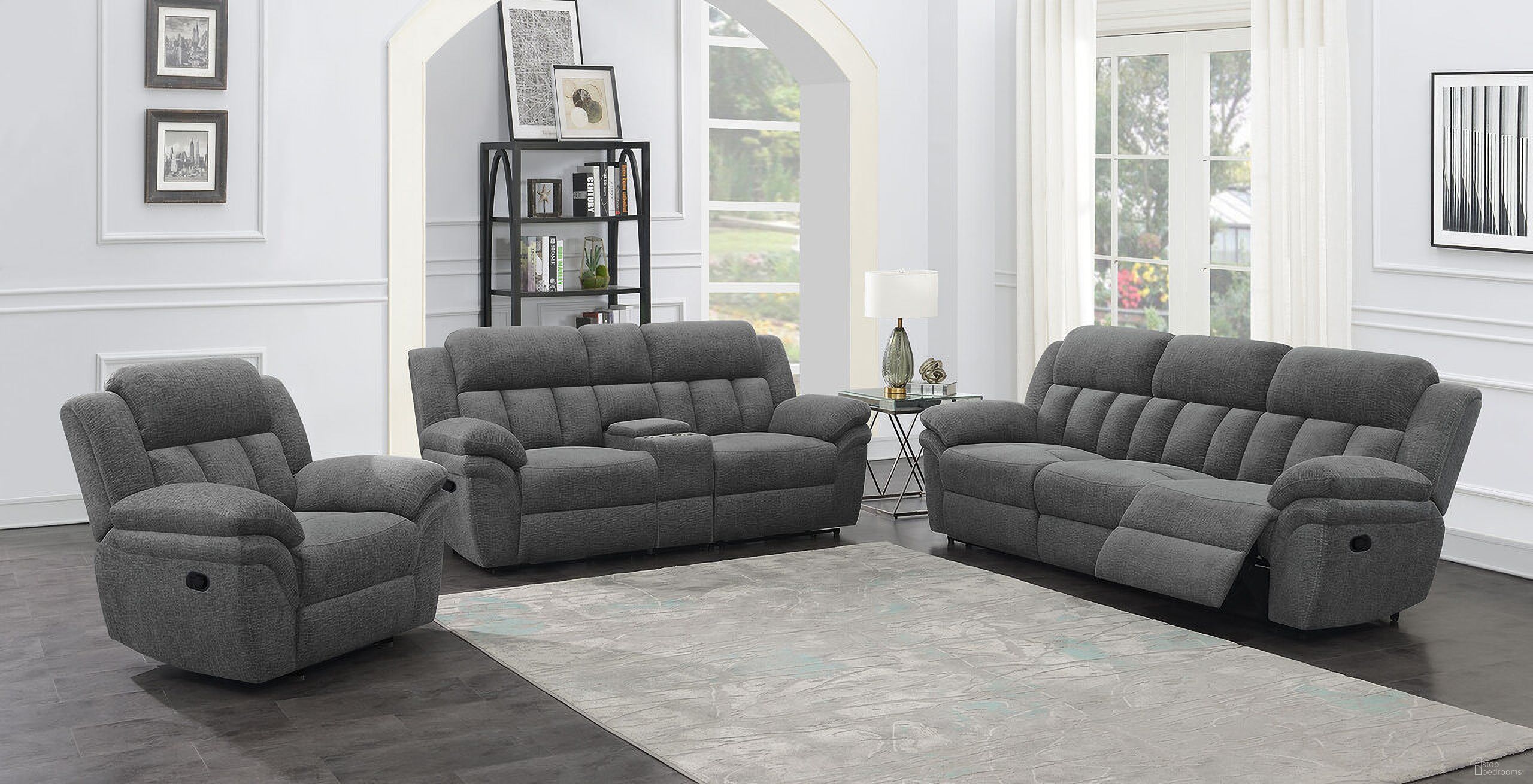 The appearance of Bahrain Upholstered Motion Living Room Set In Charcoal designed by Coaster in the transitional interior design. This charcoal piece of furniture was selected by 1StopBedrooms from Bahrain Collection to add a touch of cosiness and style into your home. Sku: 609540AC;609540LR;609540RR;609540CON;609540LR;609540RR. Material: Upholstered.