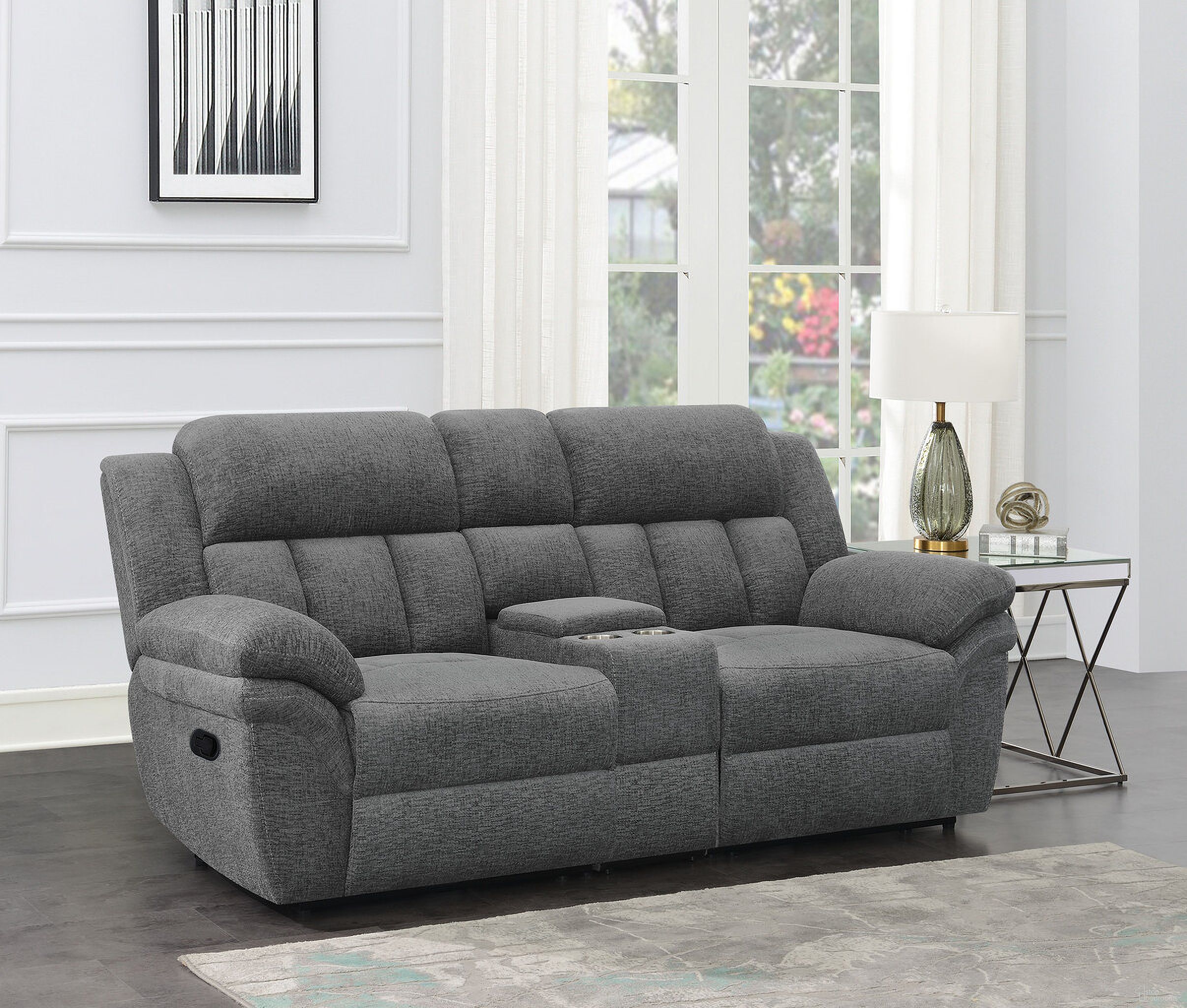 The appearance of Bahrain Upholstered Motion Loveseat with Console Charcoal designed by Coaster in the transitional interior design. This charcoal piece of furniture was selected by 1StopBedrooms from Bahrain Collection to add a touch of cosiness and style into your home. Sku: 609540CON;609540LR;609540RR. Material: Upholstered.