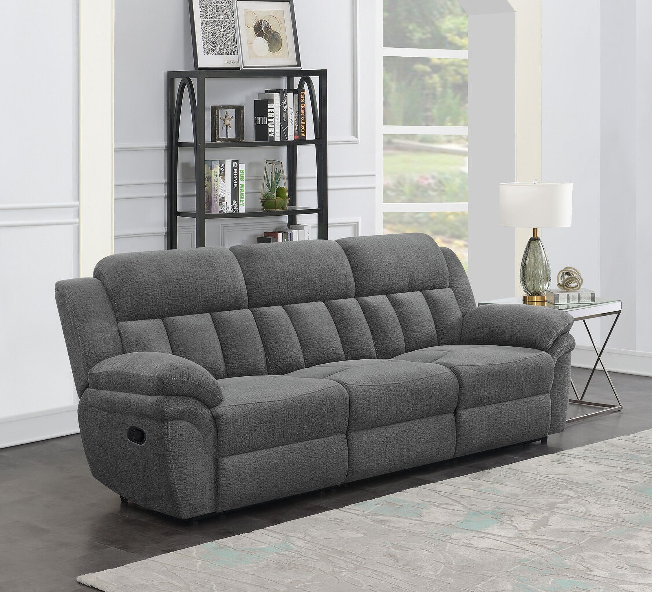 The appearance of Bahrain Upholstered Motion Sofa Charcoal designed by Coaster in the transitional interior design. This charcoal piece of furniture was selected by 1StopBedrooms from Bahrain Collection to add a touch of cosiness and style into your home. Sku: 609540AC;609540LR;609540RR. Material: Upholstered.