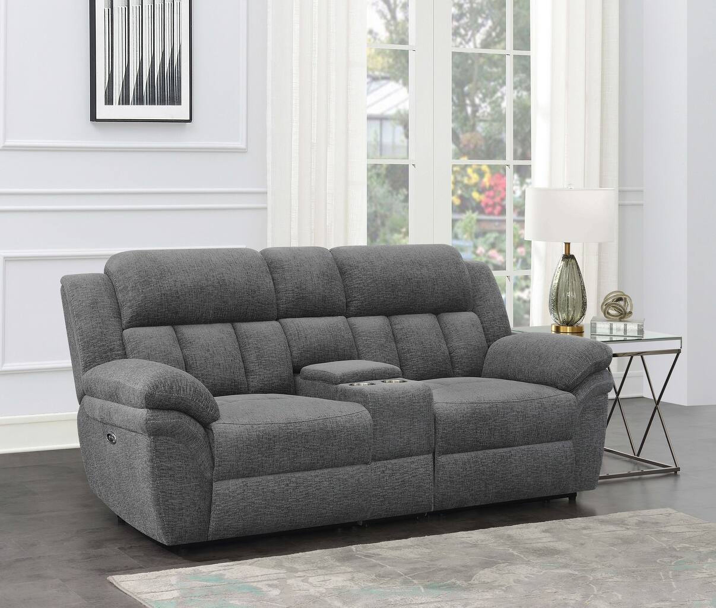 The appearance of Bahrain Upholstered Power Loveseat with Console Charcoal designed by Coaster in the transitional interior design. This charcoal piece of furniture was selected by 1StopBedrooms from Bahrain Collection to add a touch of cosiness and style into your home. Sku: 609540CON;609540LRP;609540RRP. Material: Upholstered.