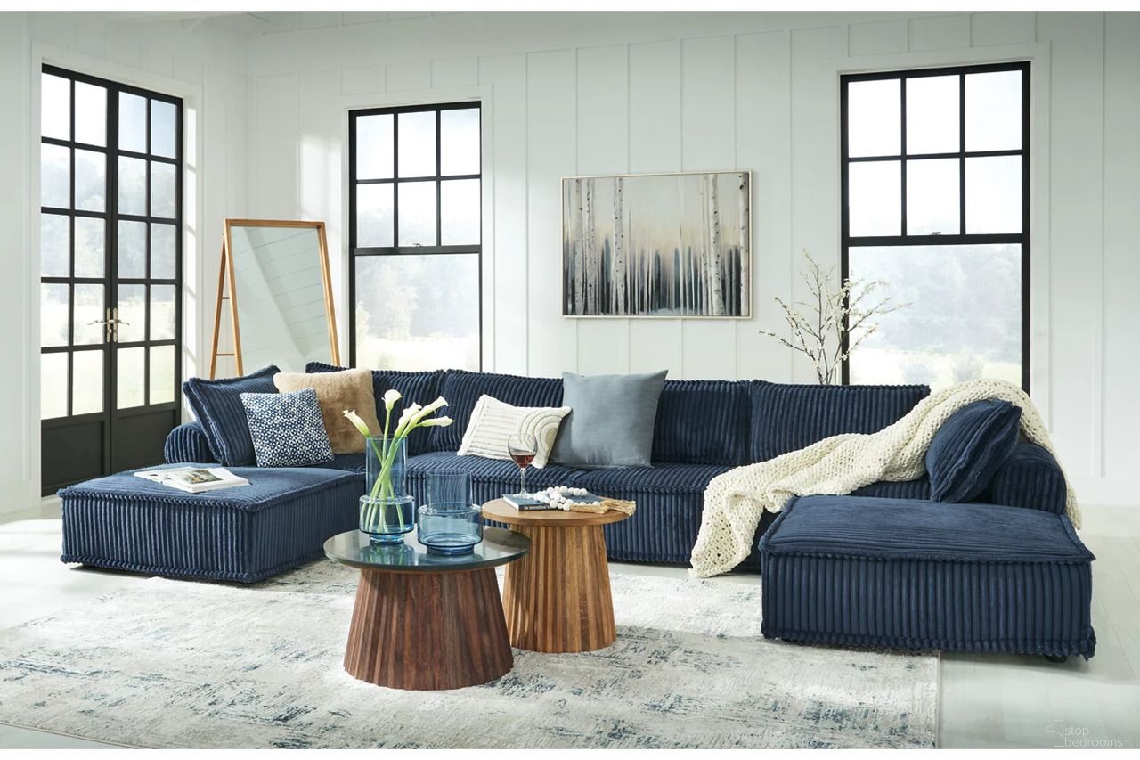The appearance of Bales 6-Piece Modular Seating In Navy designed by Signature Design by Ashley in the transitional interior design. This navy piece of furniture  was selected by 1StopBedrooms from Bales Collection to add a touch of cosiness and style into your home. Sku: A3000662;A3000662;A3000662;A3000662;A3000662;A3000662. Material: Polyester.