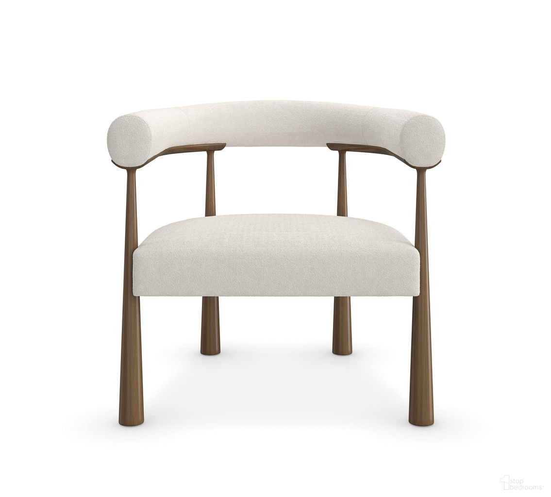 The appearance of Bali Accent Chair In Cream designed by Caracole in the modern / contemporary interior design. This cream piece of furniture  was selected by 1StopBedrooms from Bali Collection to add a touch of cosiness and style into your home. Sku: M150-023-131-C. Material: Boucle.