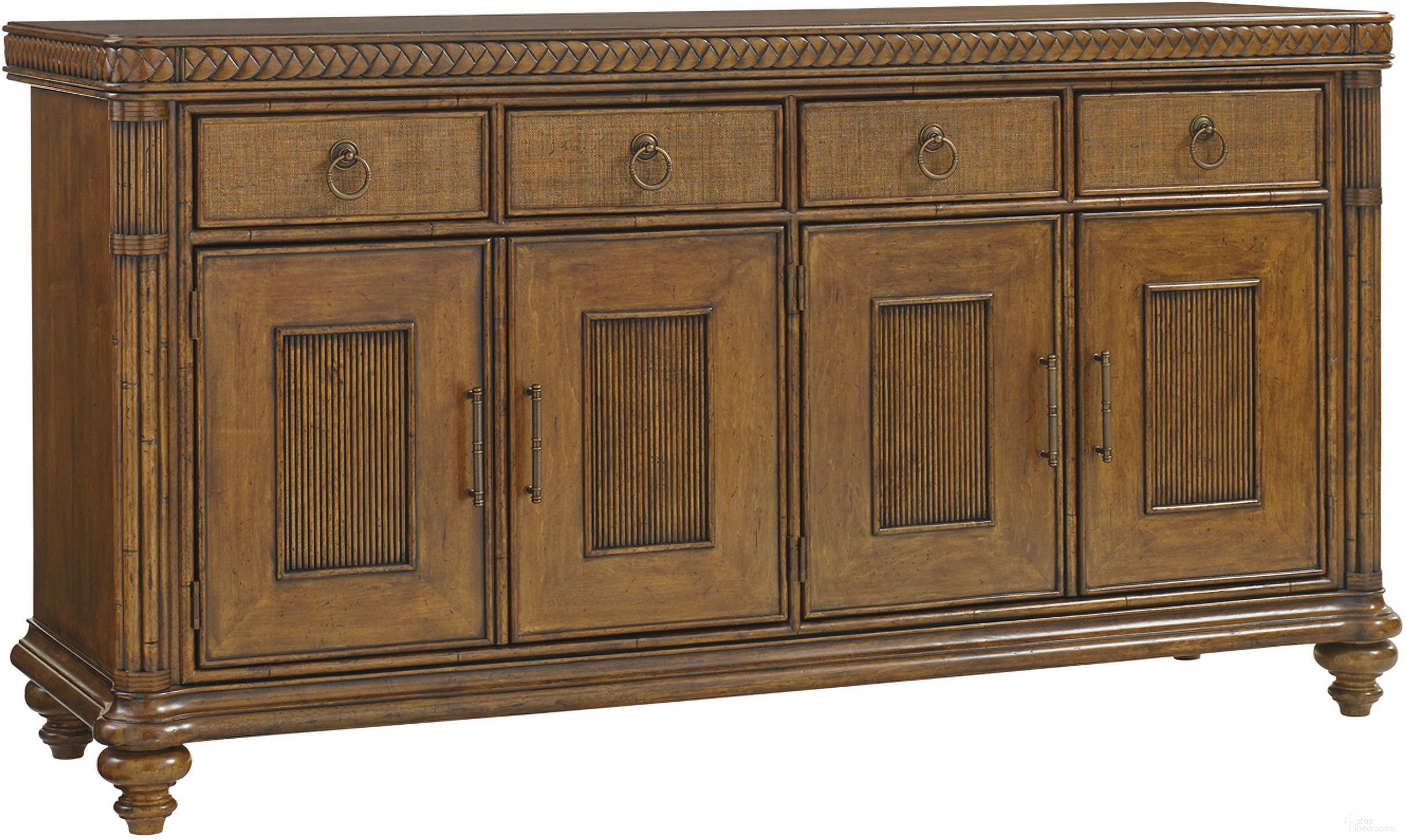 The appearance of Bali Hai Trident Buffet In Sunset designed by Tommy Bahama in the transitional interior design. This sunset piece of furniture  was selected by 1StopBedrooms from Bali Hai Collection to add a touch of cosiness and style into your home. Sku: 593-852. Material: Rattan.