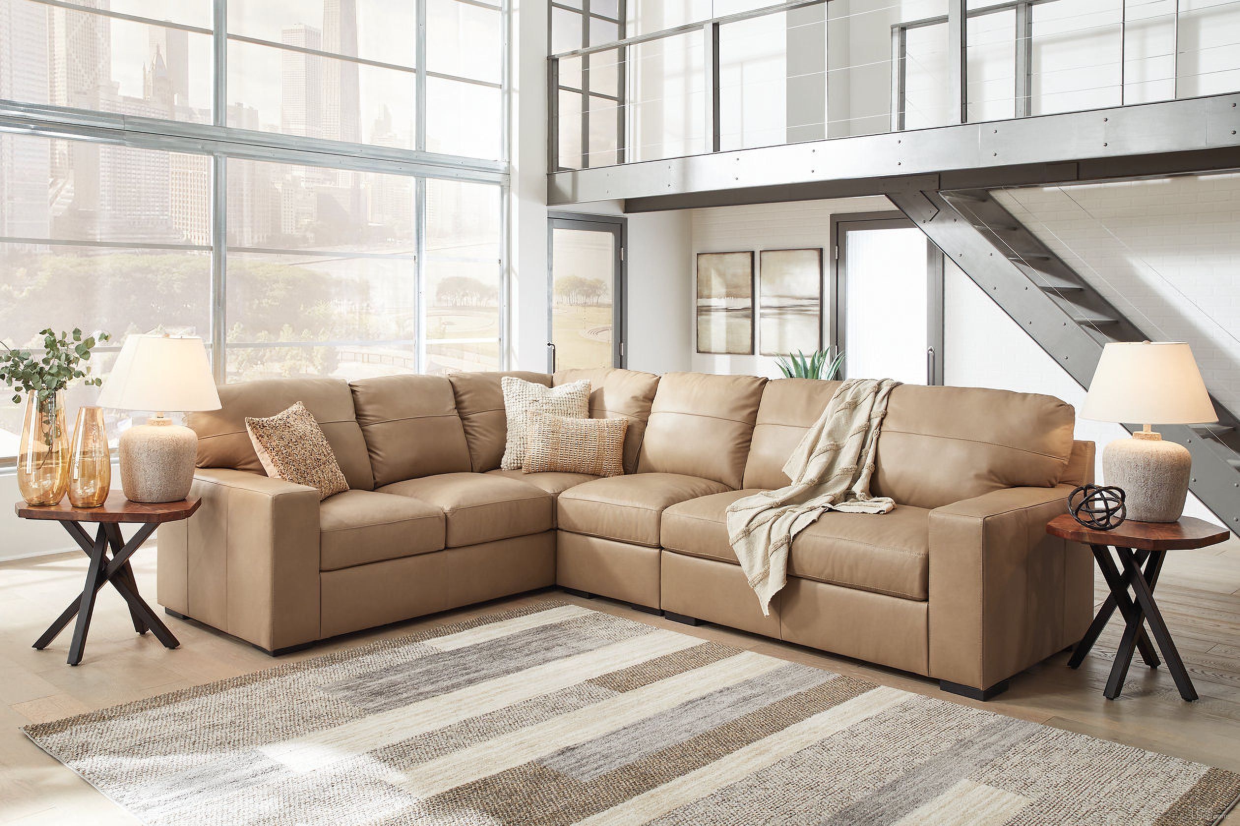 The appearance of Bandon 3-Piece LAF Sectional In Toffee designed by Signature Design by Ashley in the modern / contemporary interior design. This toffee piece of furniture  was selected by 1StopBedrooms from Bandon Collection to add a touch of cosiness and style into your home. Sku: 3800648;3800646;3800656. Material: Leather. Layout: L-Shape.