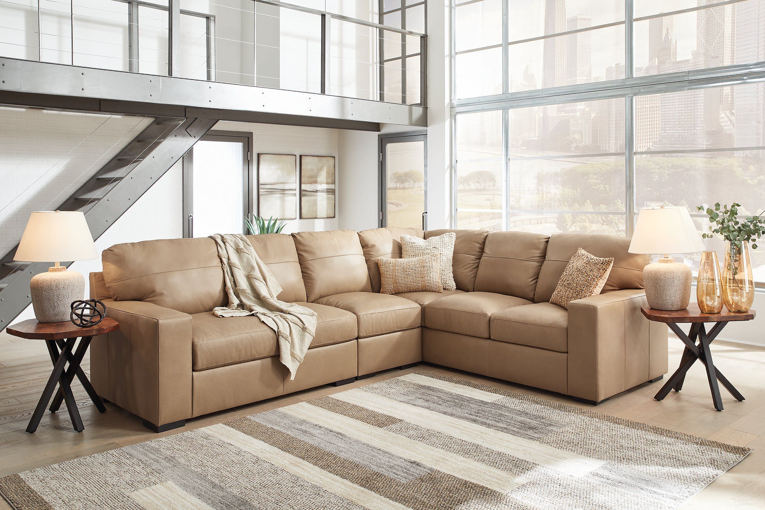 The appearance of Bandon 3-Piece RAF Sectional In Toffee designed by Signature Design by Ashley in the modern / contemporary interior design. This toffee piece of furniture  was selected by 1StopBedrooms from Bandon Collection to add a touch of cosiness and style into your home. Sku: 3800655;3800646;3800649. Material: Leather. Layout: L-Shape.