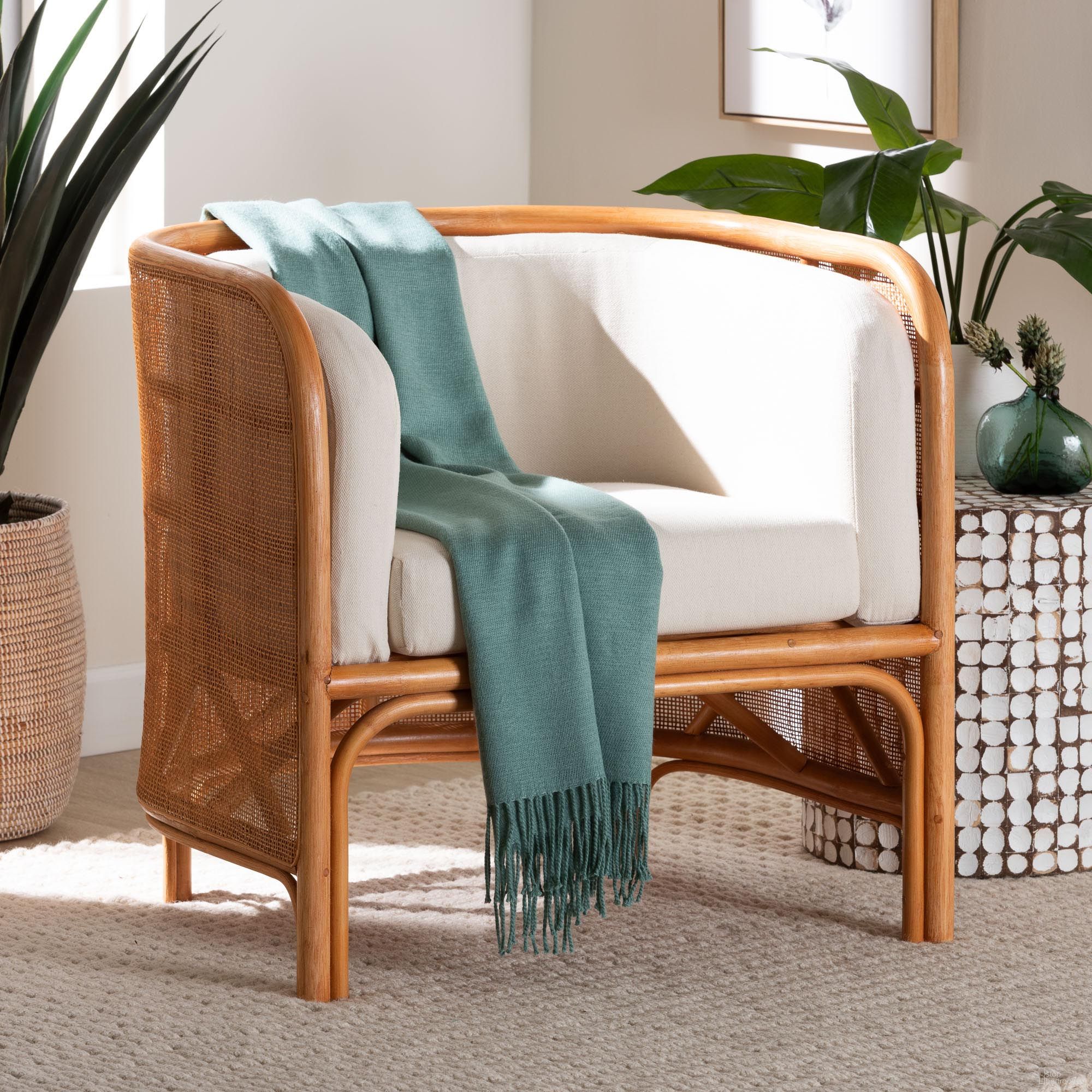 The appearance of Bandung Rattan Accent Chair In Light Honey designed by Baxton Studio in the bohemian interior design. This light honey piece of furniture  was selected by 1StopBedrooms from Bandung Collection to add a touch of cosiness and style into your home. Sku: Bandung-Light Honey Rattan-AC. Material: Natural Rattan.