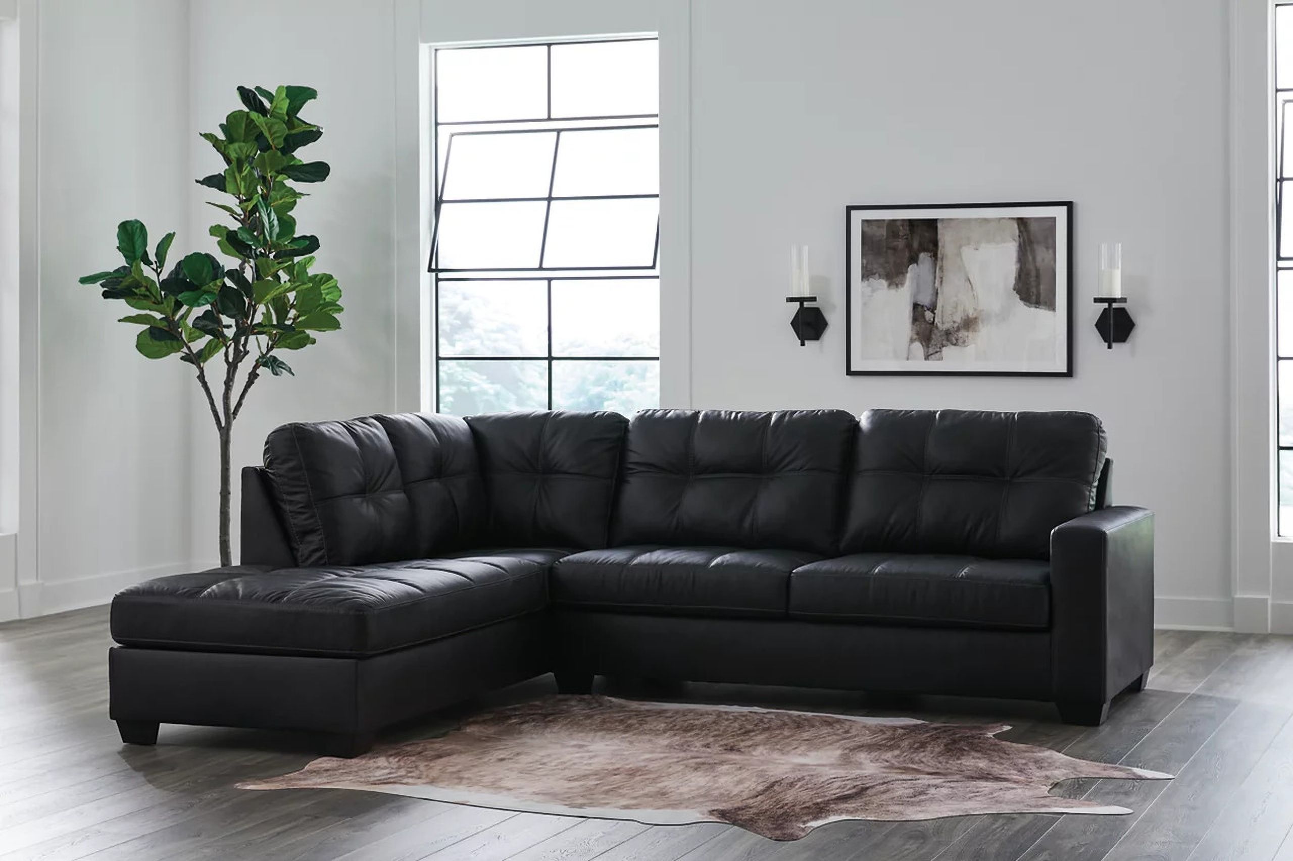 The appearance of Barlin Mills 2 Piece Sectional with Chaise In Carbon designed by Signature Design by Ashley in the modern / contemporary interior design. This carbon piece of furniture was selected by 1StopBedrooms from Barlin Mills Collection to add a touch of cosiness and style into your home. Sku: 1700416;1700467. Material: Leather. Layout: LAF.