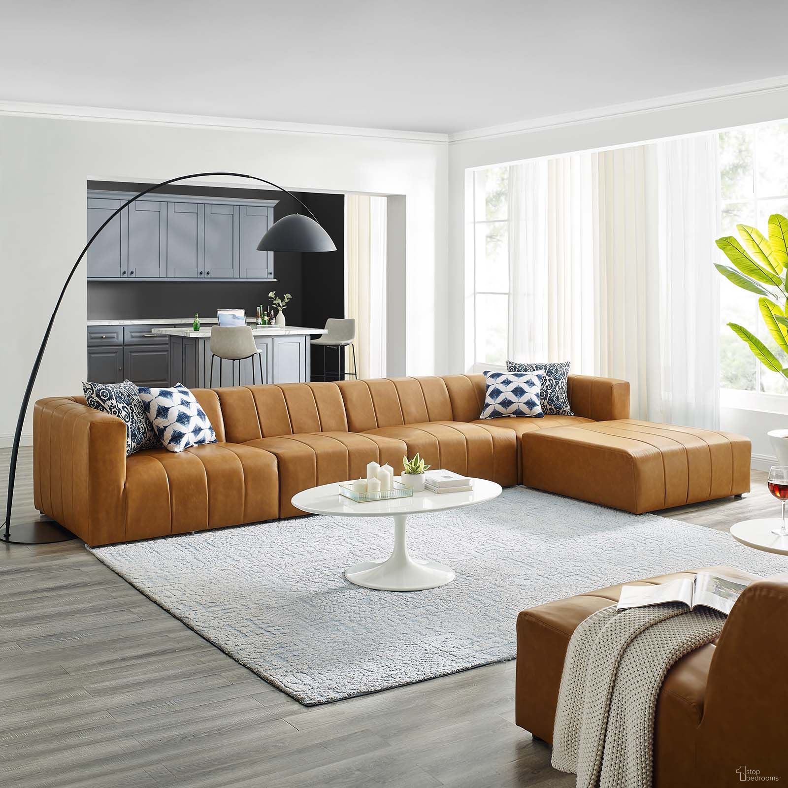 The appearance of Bartlett Vegan Leather 5-Piece Sectional Sofa In Tan EEI-4521-TAN designed by Modway in the modern / contemporary interior design. This tan piece of furniture was selected by 1StopBedrooms from Bartlett Collection to add a touch of cosiness and style into your home. Sku: EEI-4395-TAN;EEI-4397-TAN;EEI-4399-TAN;EEI-4399-TAN;EEI-4401-TAN. Material: Fabric. Layout: L-Shape.