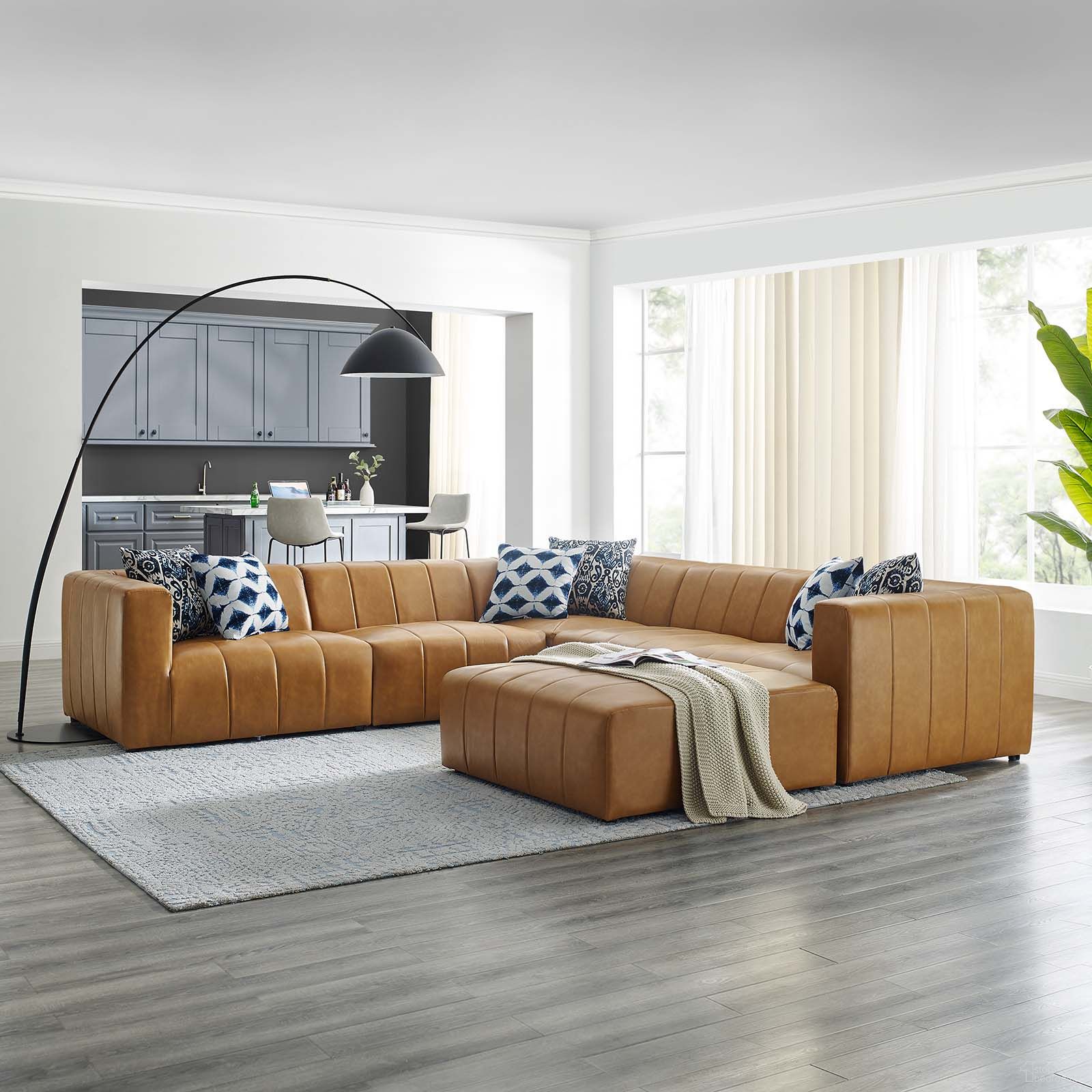 The appearance of Bartlett Vegan Leather 6-Piece Sectional Sofa In Tan designed by Modway in the modern / contemporary interior design. This tan piece of furniture was selected by 1StopBedrooms from Bartlett Collection to add a touch of cosiness and style into your home. Sku: EEI-4395-TAN;EEI-4397-TAN;EEI-4399-TAN;EEI-4399-TAN;EEI-4401-TAN;EEI-4403-TAN. Material: Fabric. Layout: U-Shape.