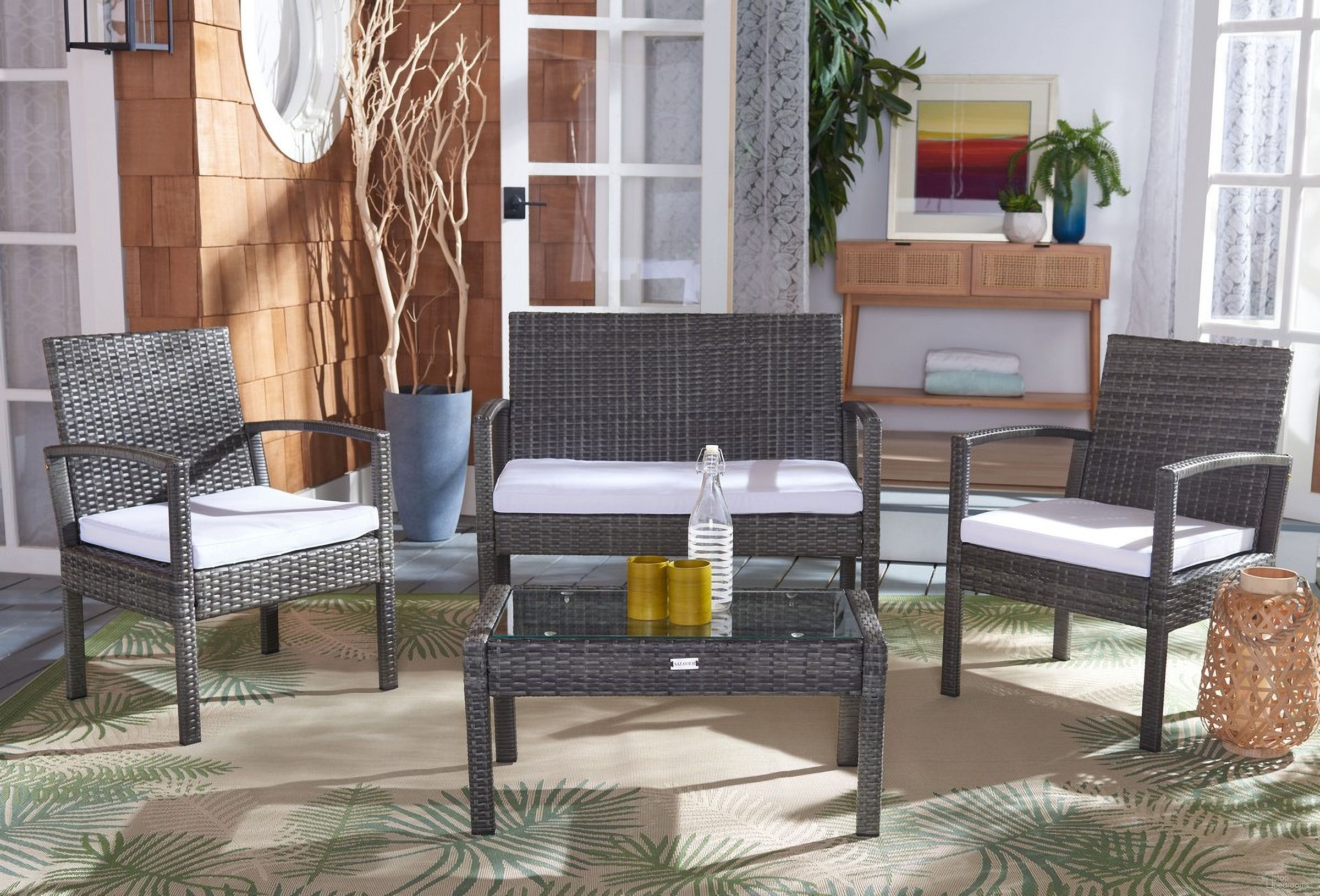 The appearance of Bassey 4 Piece Living Set In Grey designed by Safavieh in the coastal interior design. This grey piece of furniture  was selected by 1StopBedrooms from Bassey Collection to add a touch of cosiness and style into your home. Sku: PAT7507C. Material: Steel.